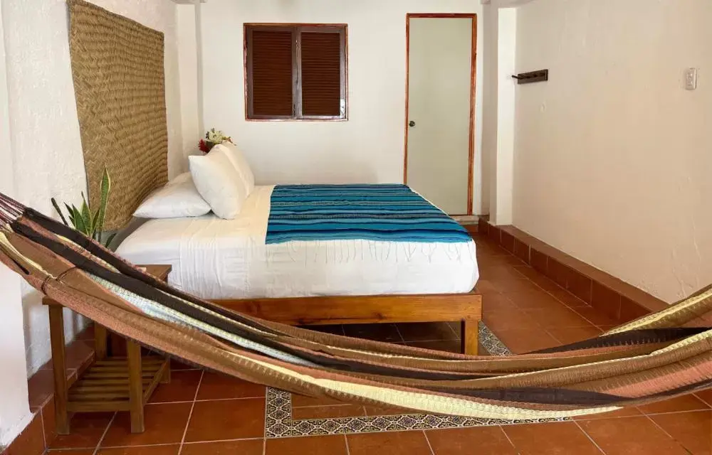 Bed in Hotel Villas Colibrí Suites & Bungalows