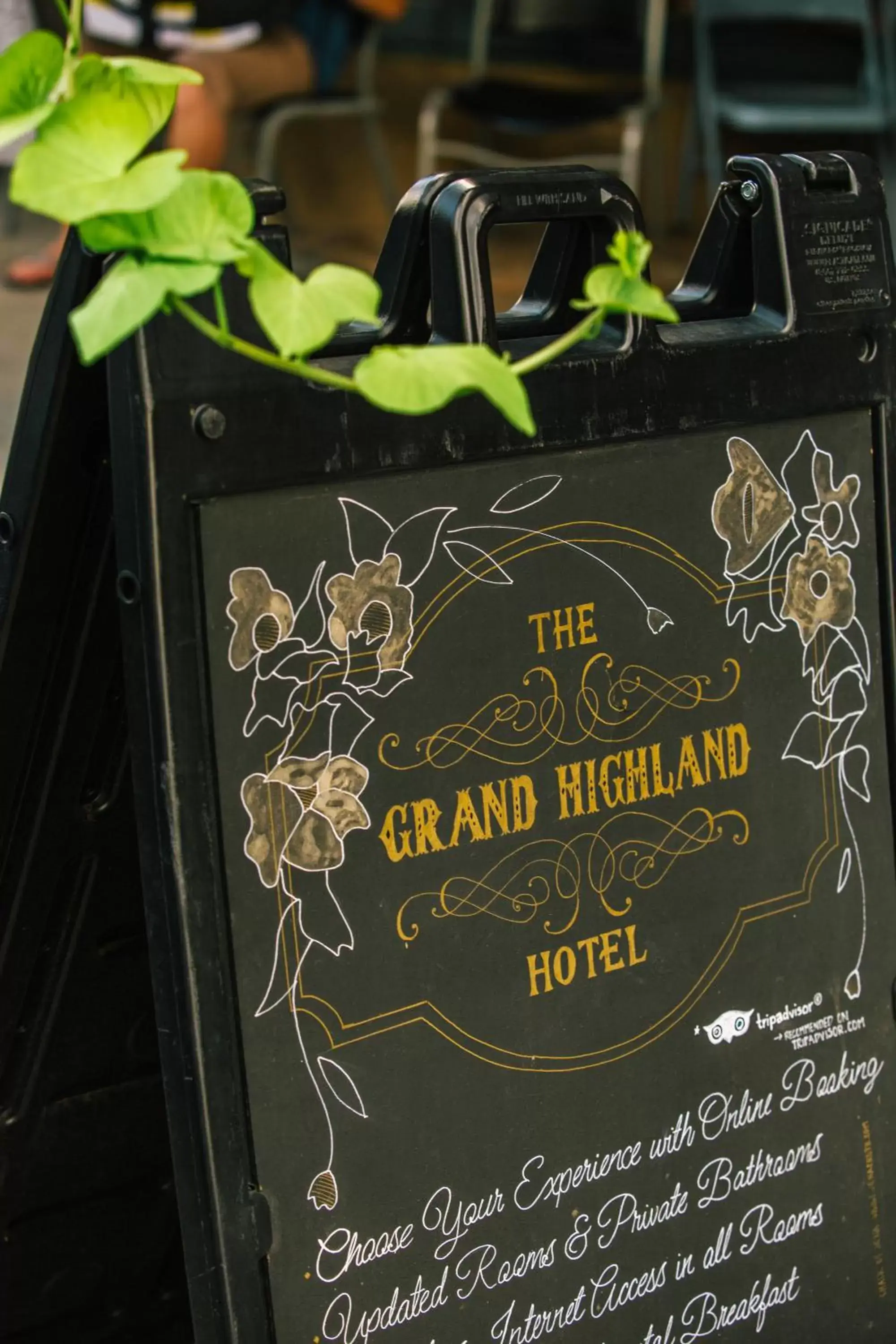 Property logo or sign in Grand Highland Hotel