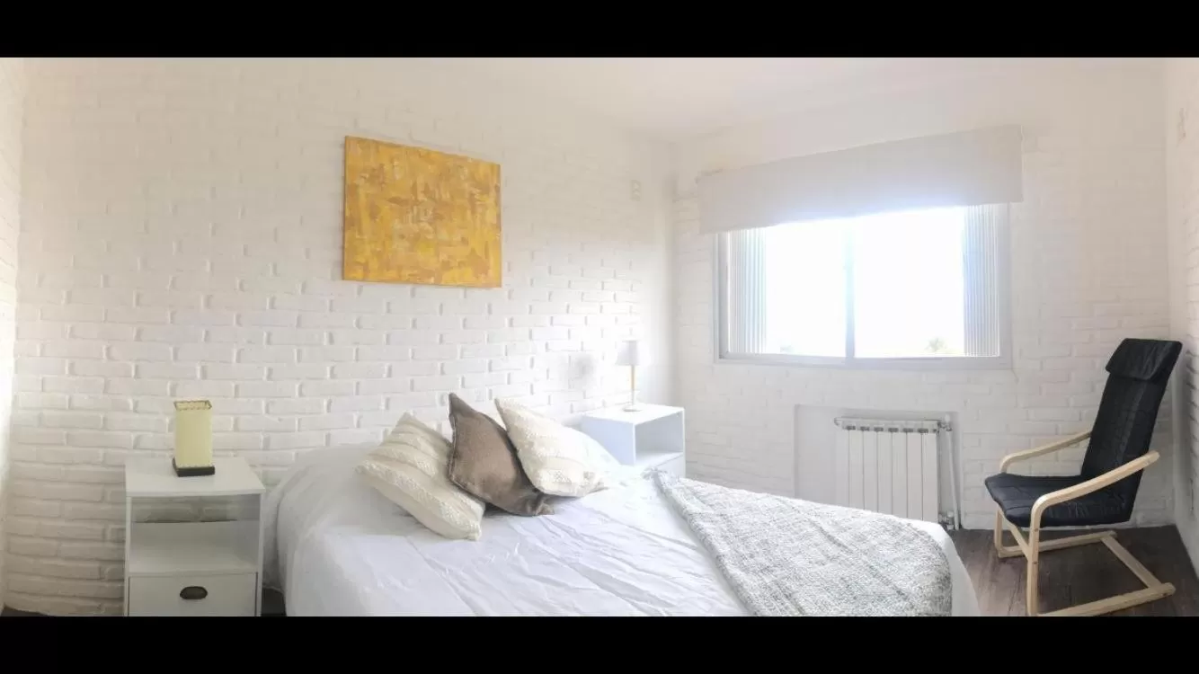 Bed in Portobello Suites Hotel