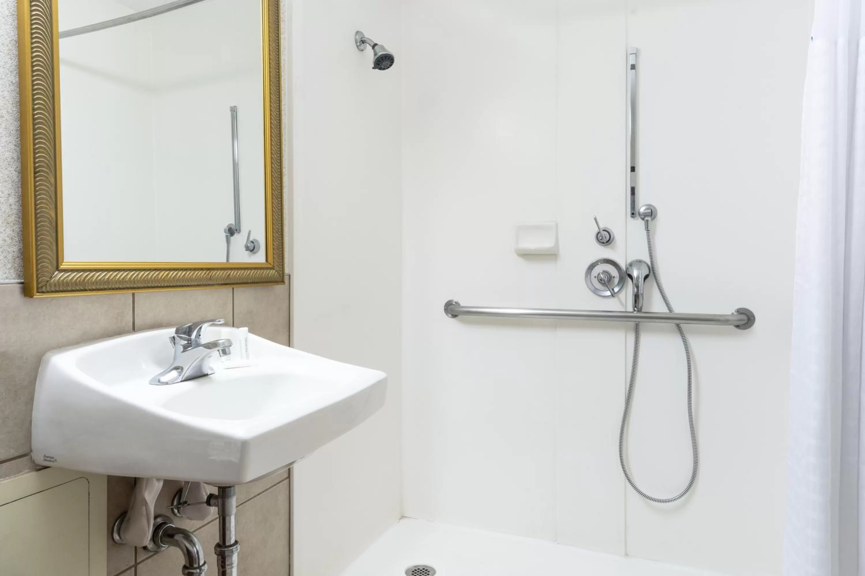 Bathroom in Ramada by Wyndham Reno Hotel & Casino