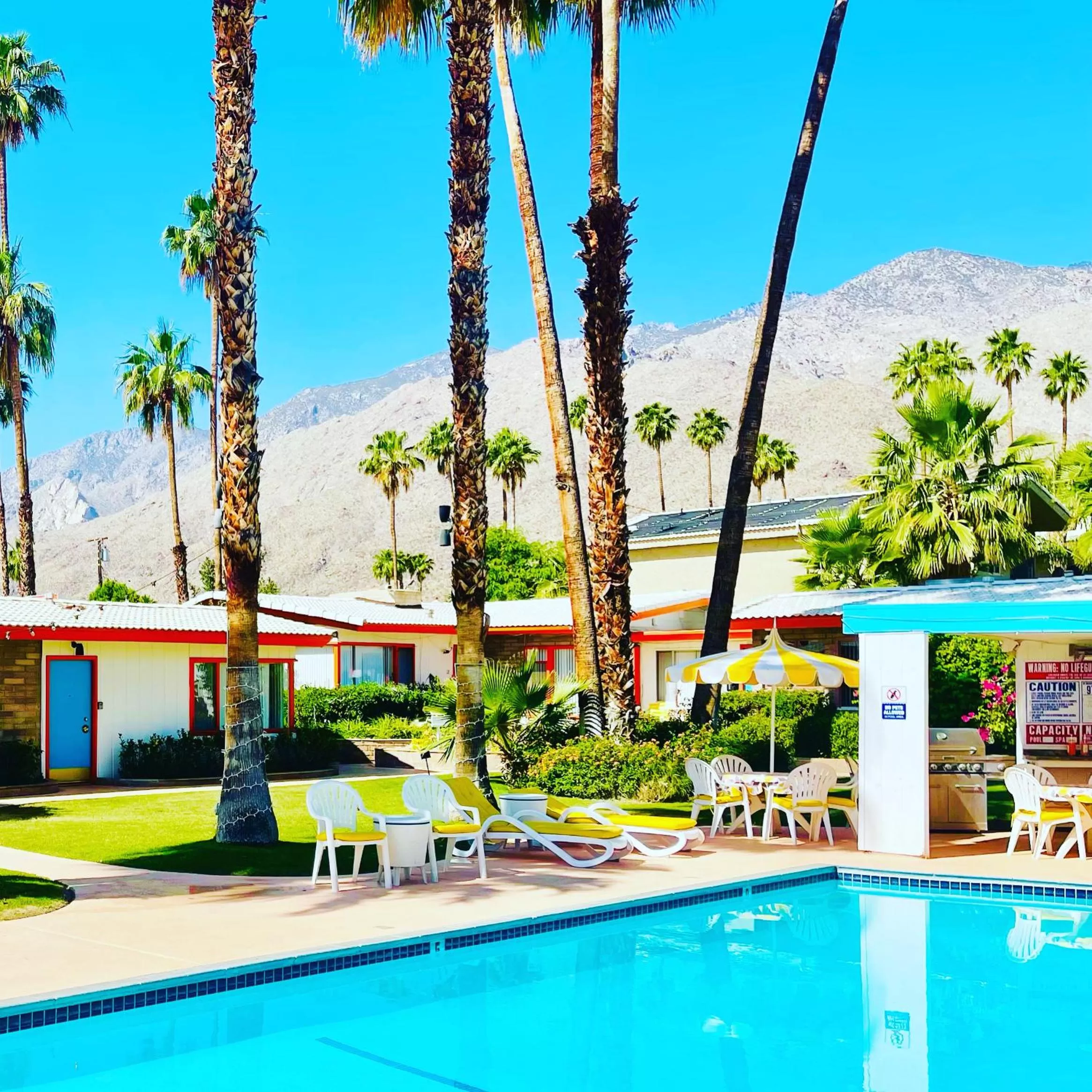 Swimming pool in A PLACE IN THE SUN Hotel - ADULTS ONLY Big Units, 24h Heated Pool & Spa in 1 Acre Park Prime Location, DOG Friendly, TOP Midcentury Modern Boutique Hotel