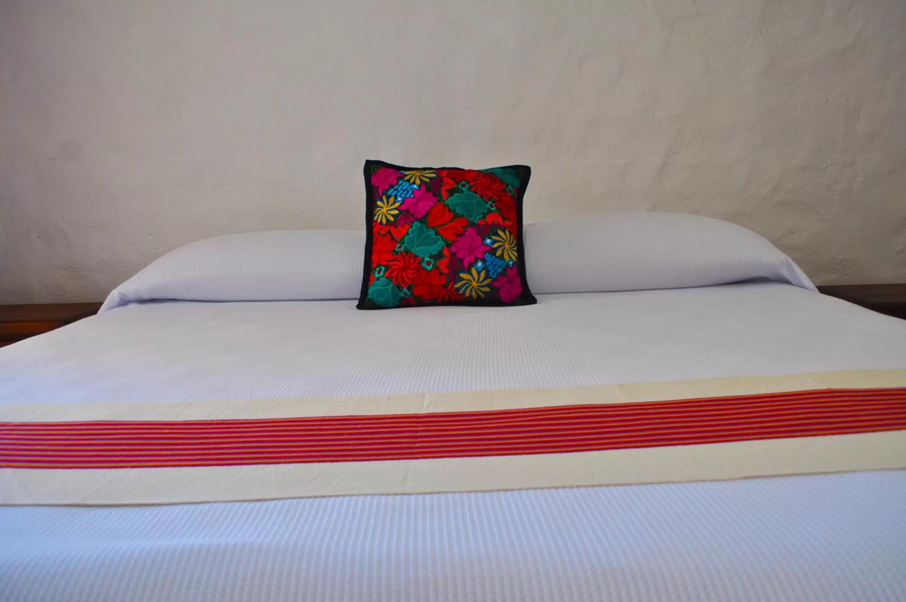 Bed in Petit Hotel Pilitas