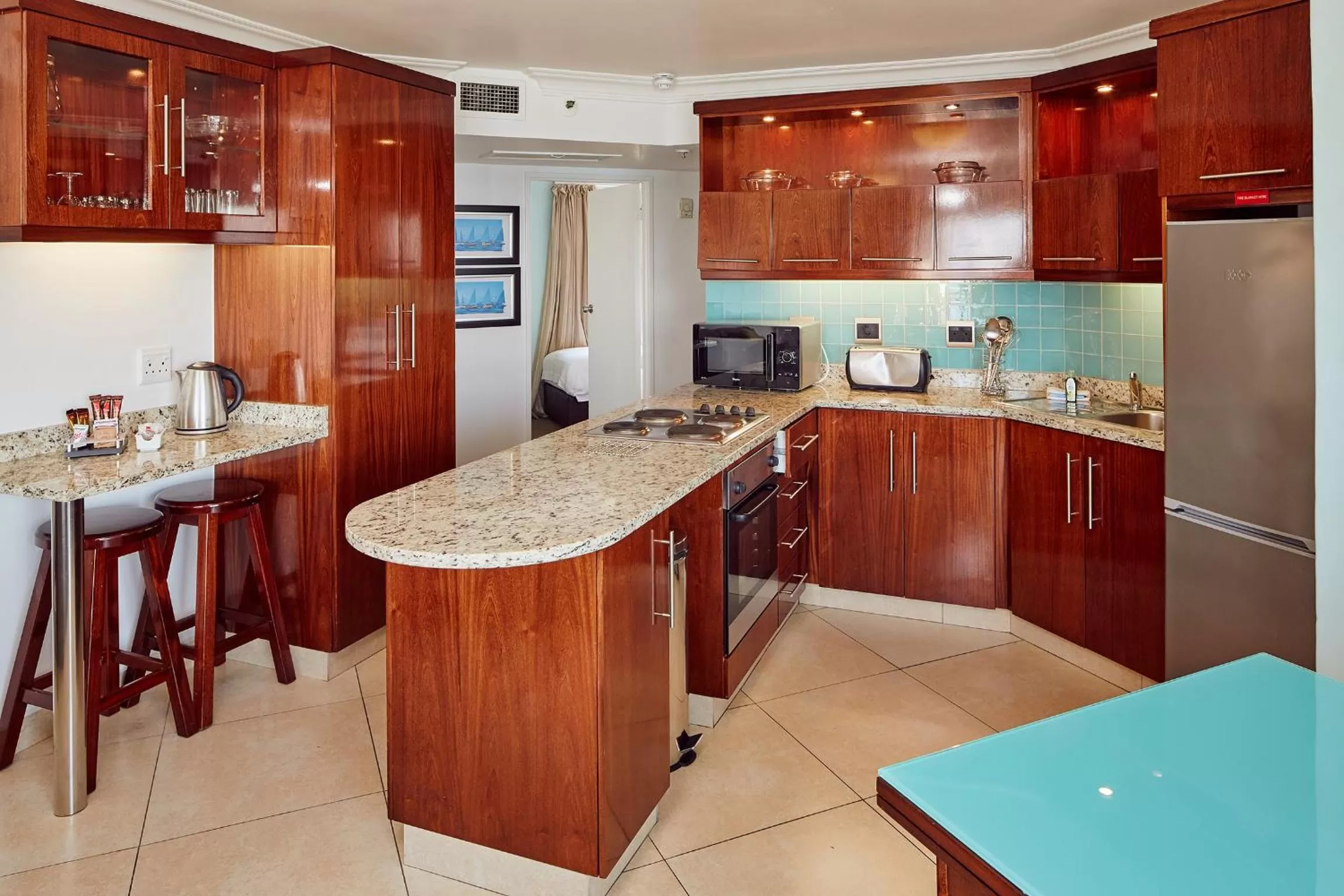 Kitchen or kitchenette in First Group The Palace All-Suite