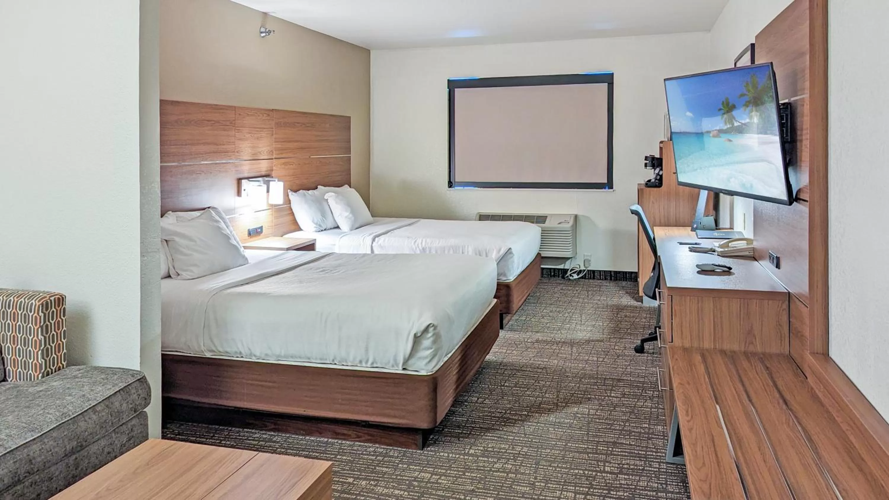 Bed in Estherville Hotel & Suites