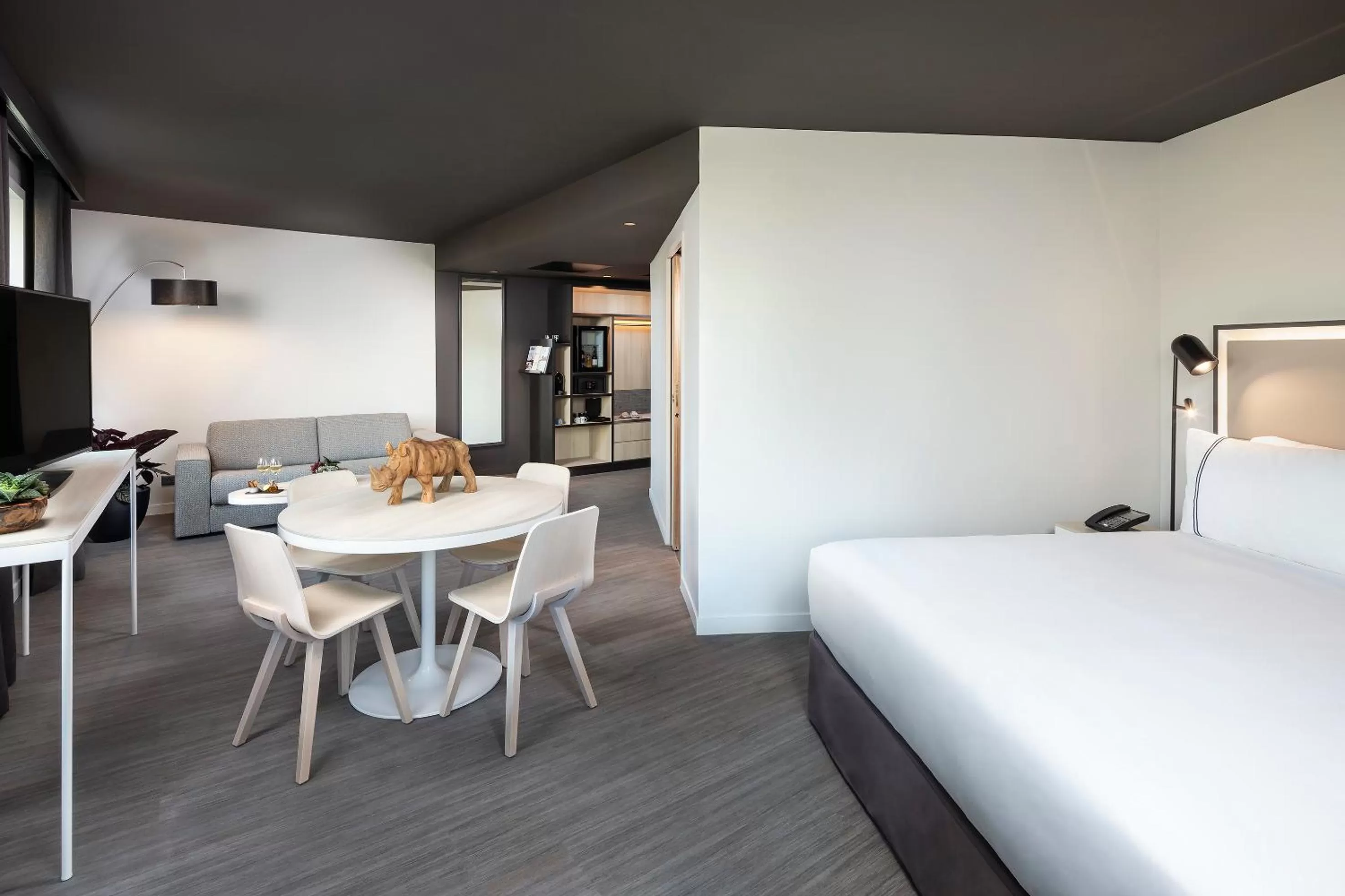 Living room, Bed in INNSiDE by Meliá Paris Charles de Gaulle Airport