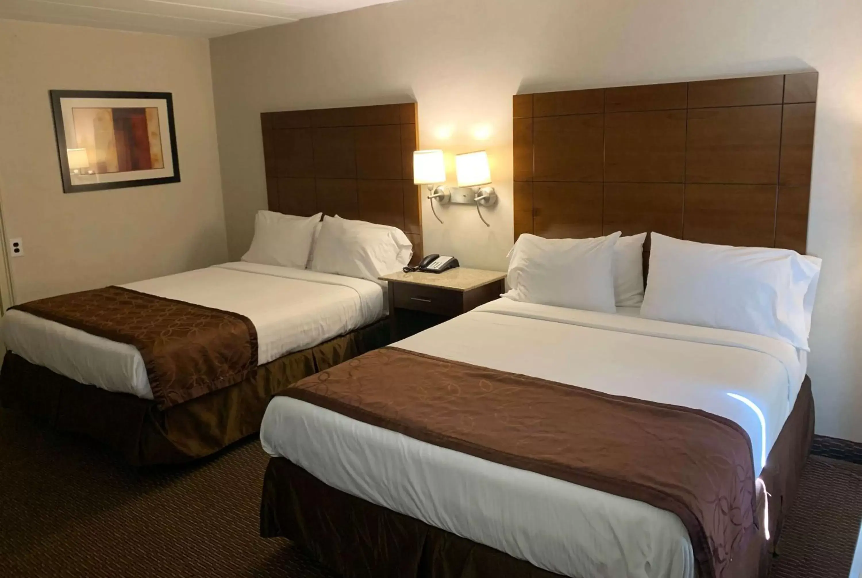 Photo of the whole room, Bed in Ramada by Wyndham Rockville Centre
