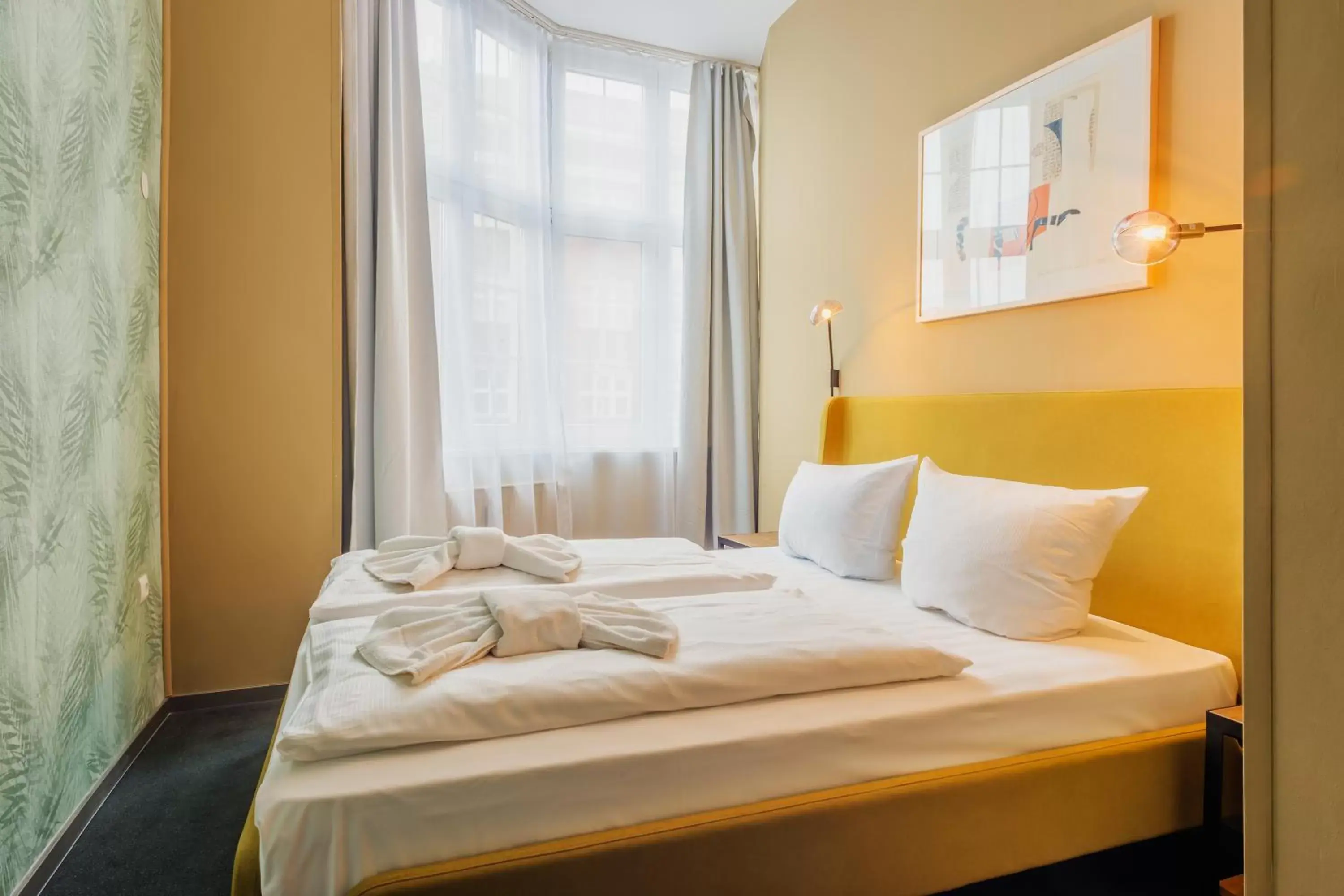 Bed in Hotel BELLEVUE am Kurfürstendamm Bed in Hotel BELLEVUE am Kurfürstendamm