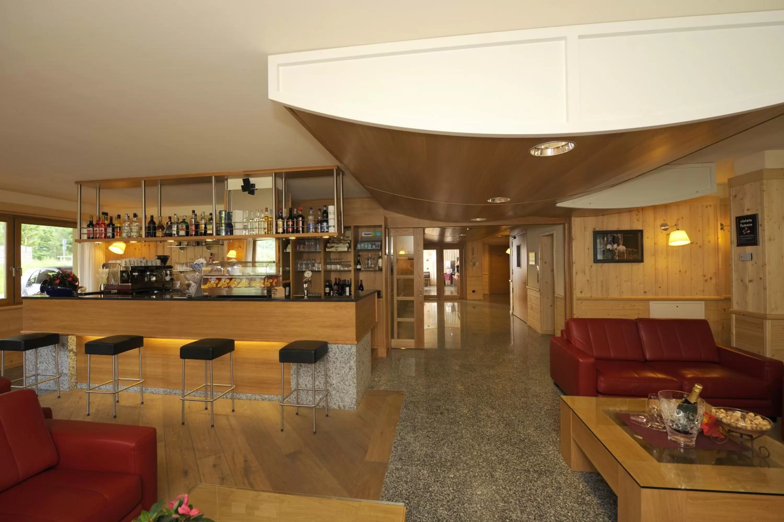 Communal lounge/ TV room in Hotel Garni Pegrà