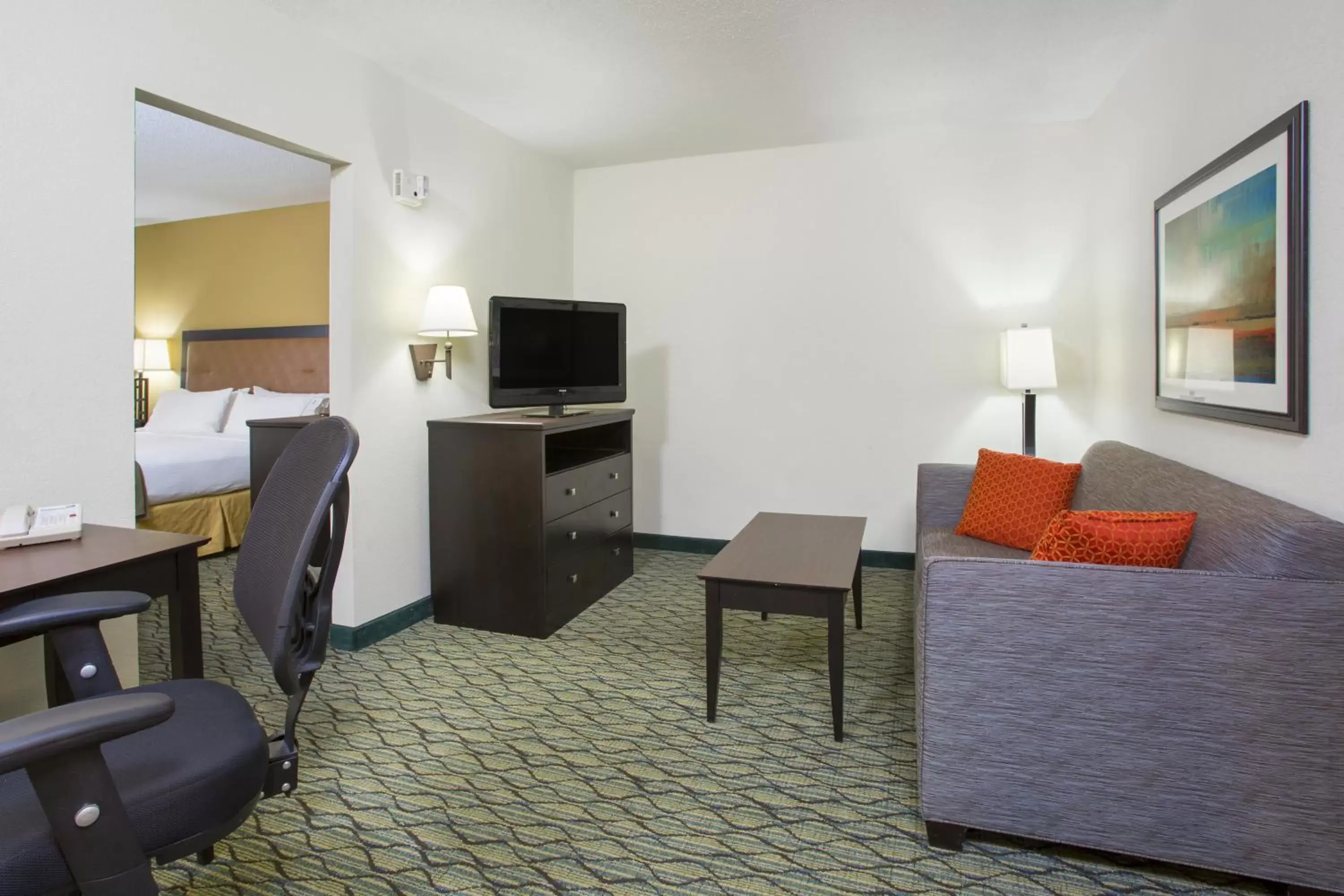 Bedroom, Seating Area in Holiday Inn Express Hotel & Suites Columbus Airport, an IHG Hotel