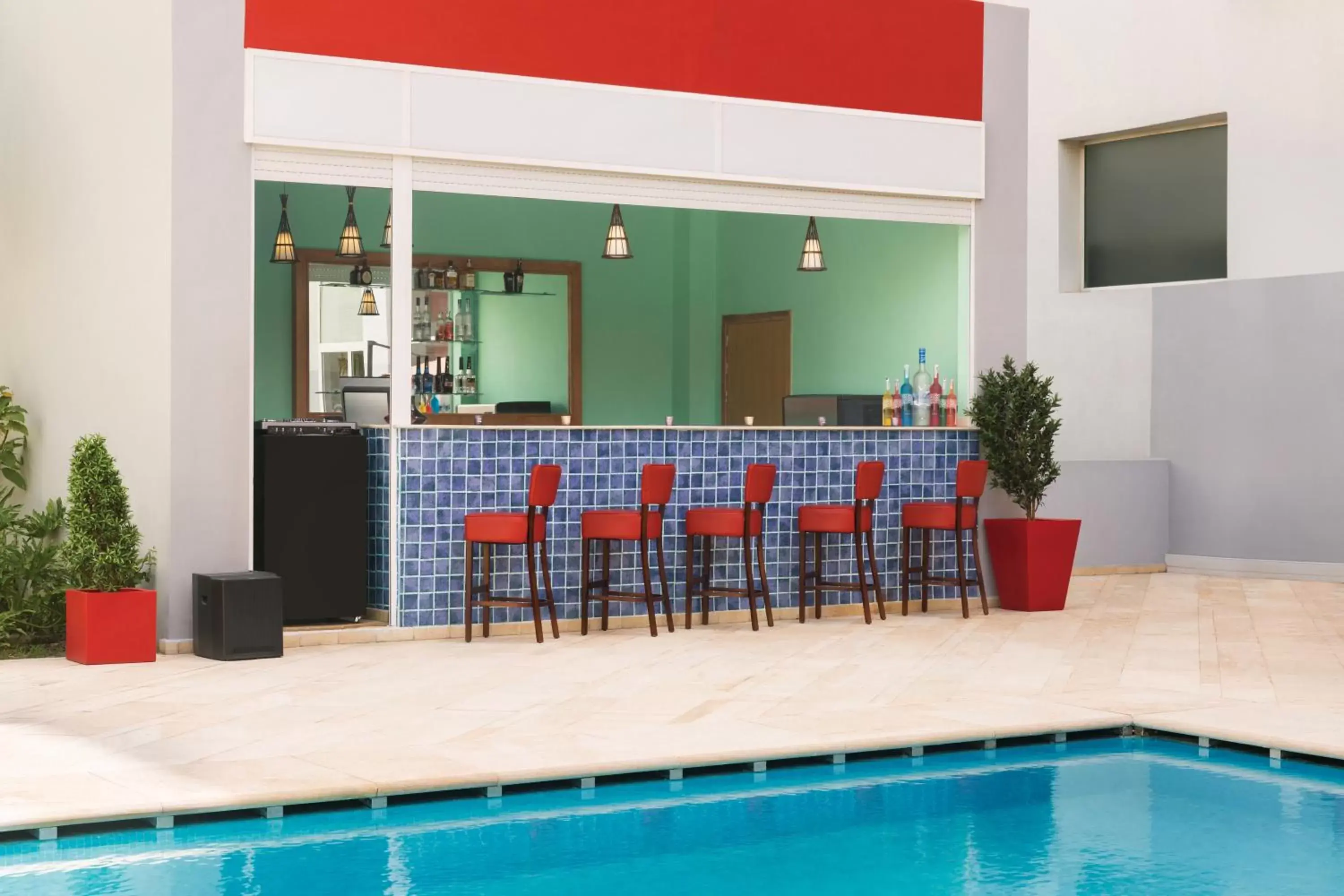 Swimming pool, Lounge/Bar in Ramada Encore By Wyndham Tangier