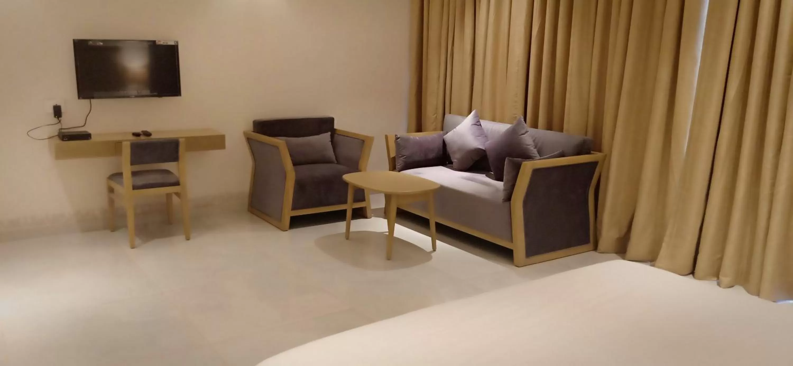 Communal lounge/ TV room, Seating Area in Sapphire Premium Hotel & Suite