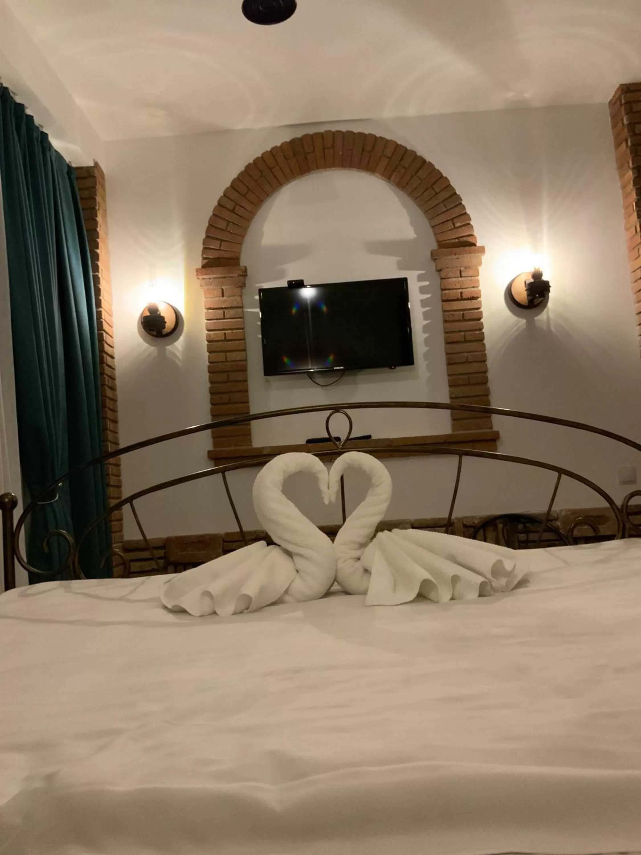 Bed in Janashia Boutique Hotels