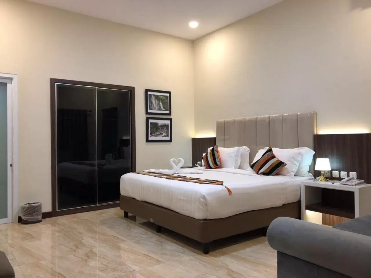 Bed in Grand Harvest Resort & Villas