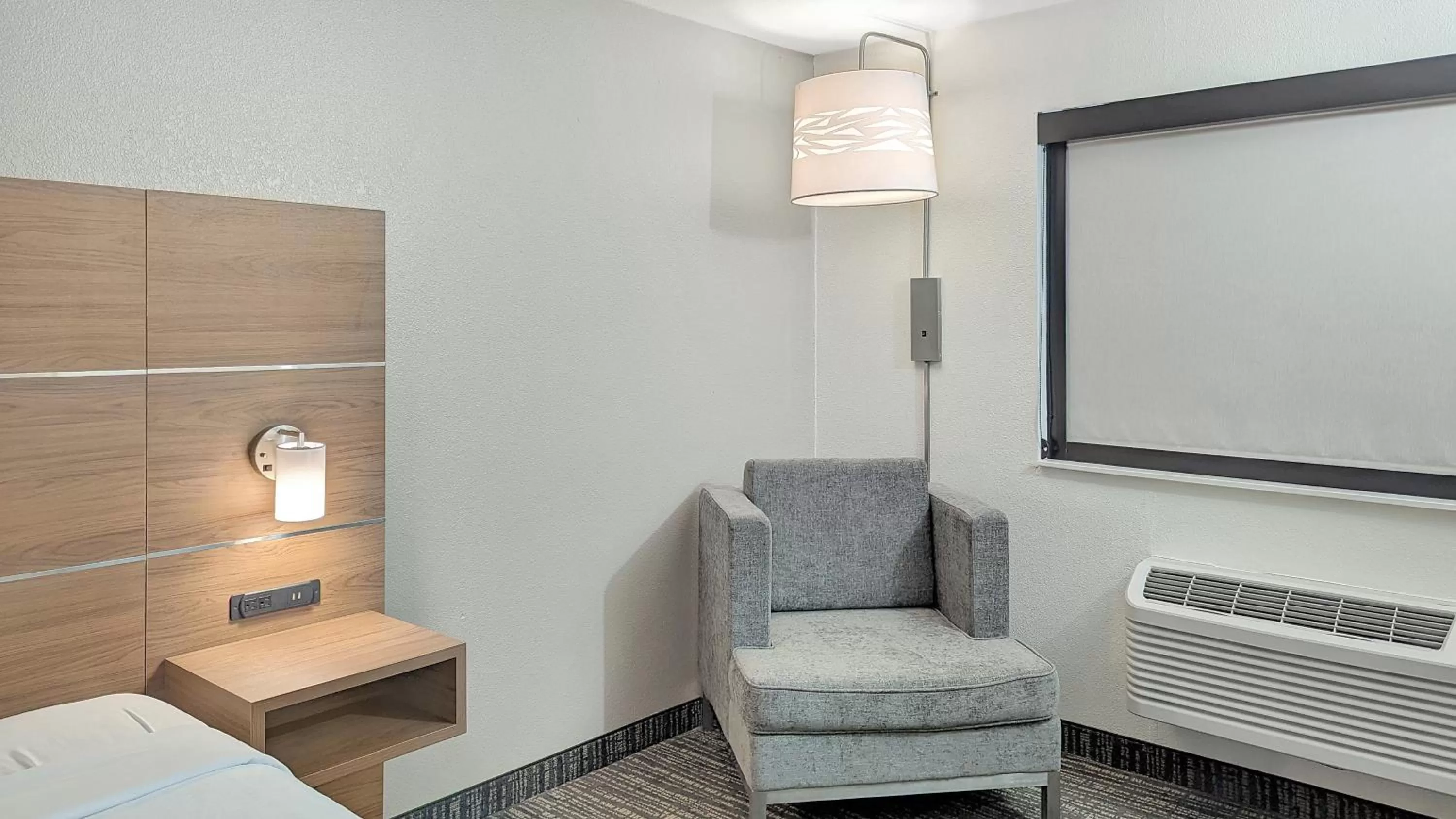 Bedroom in Estherville Hotel & Suites