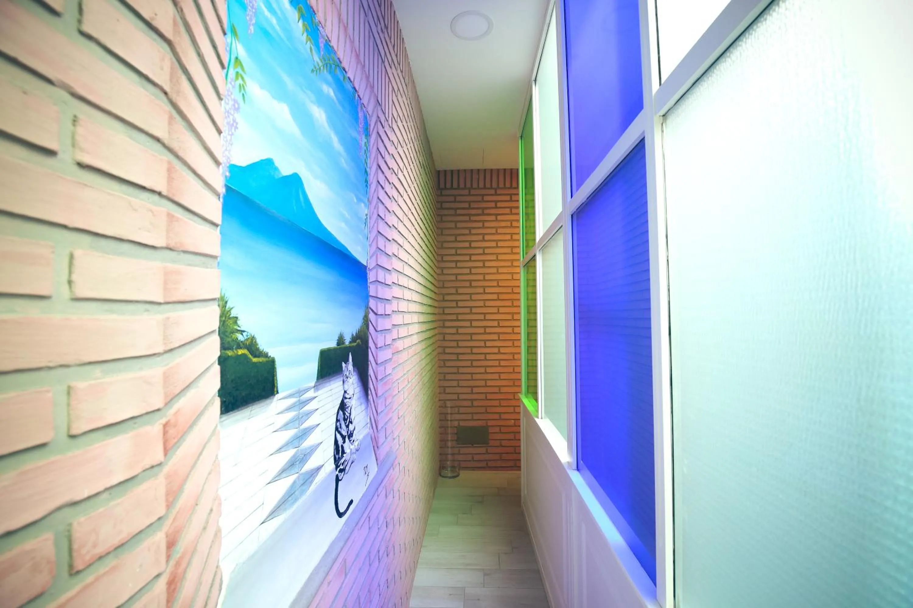 Communal lounge/ TV room in NapoliMia Boutique Hotel