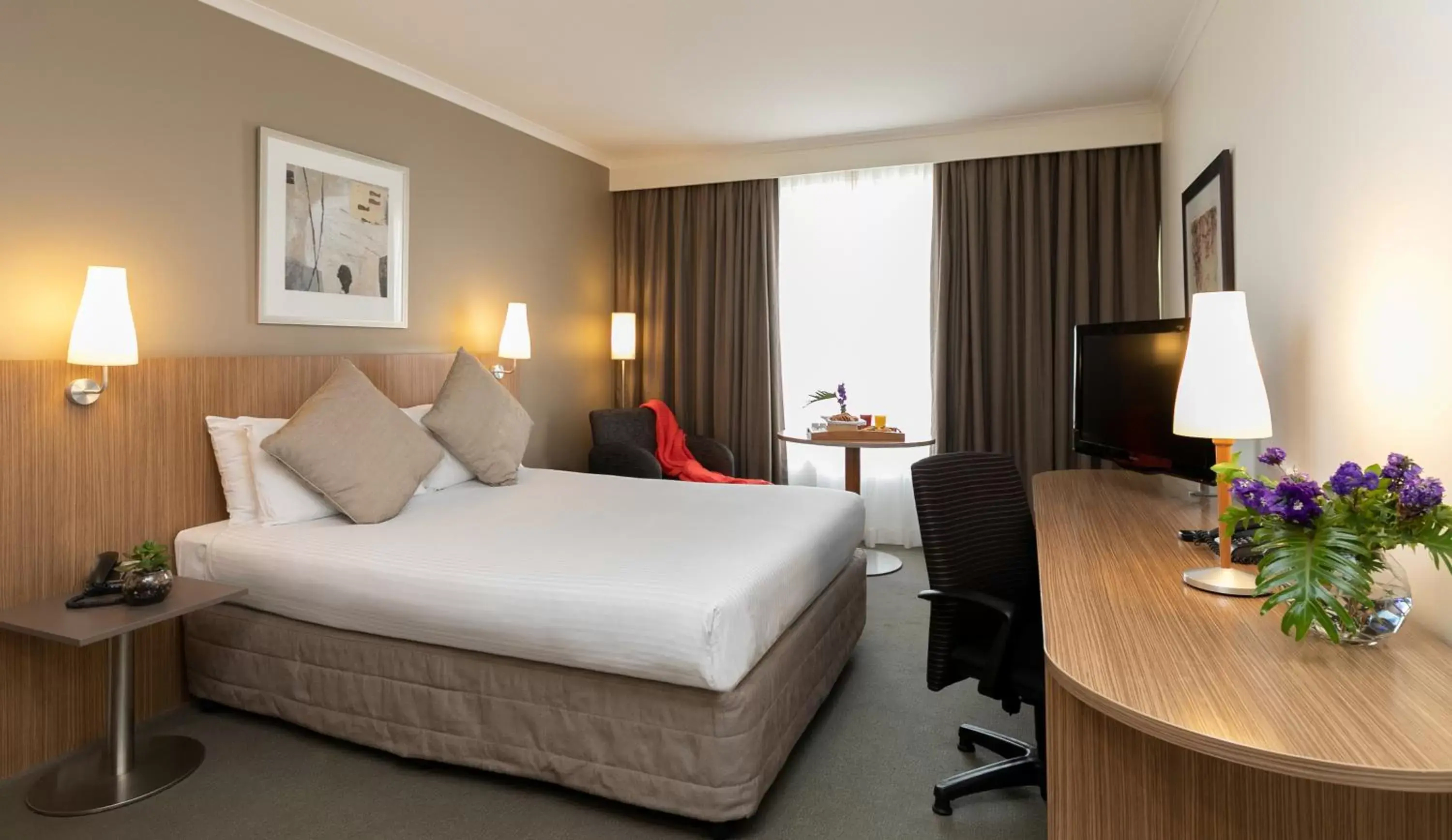 Bed in Mercure Sydney Parramatta