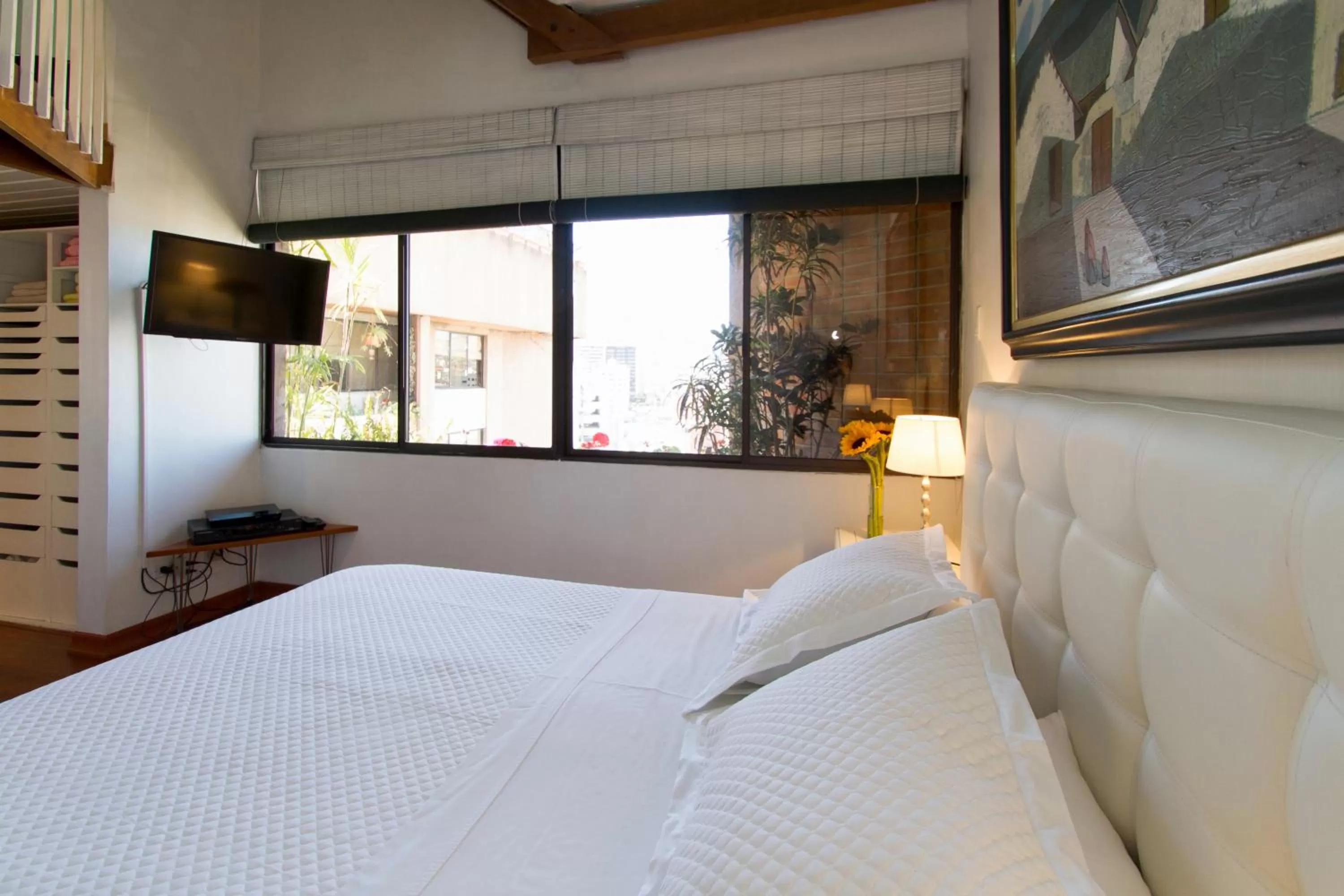 Bed in The Penthouse Lodge