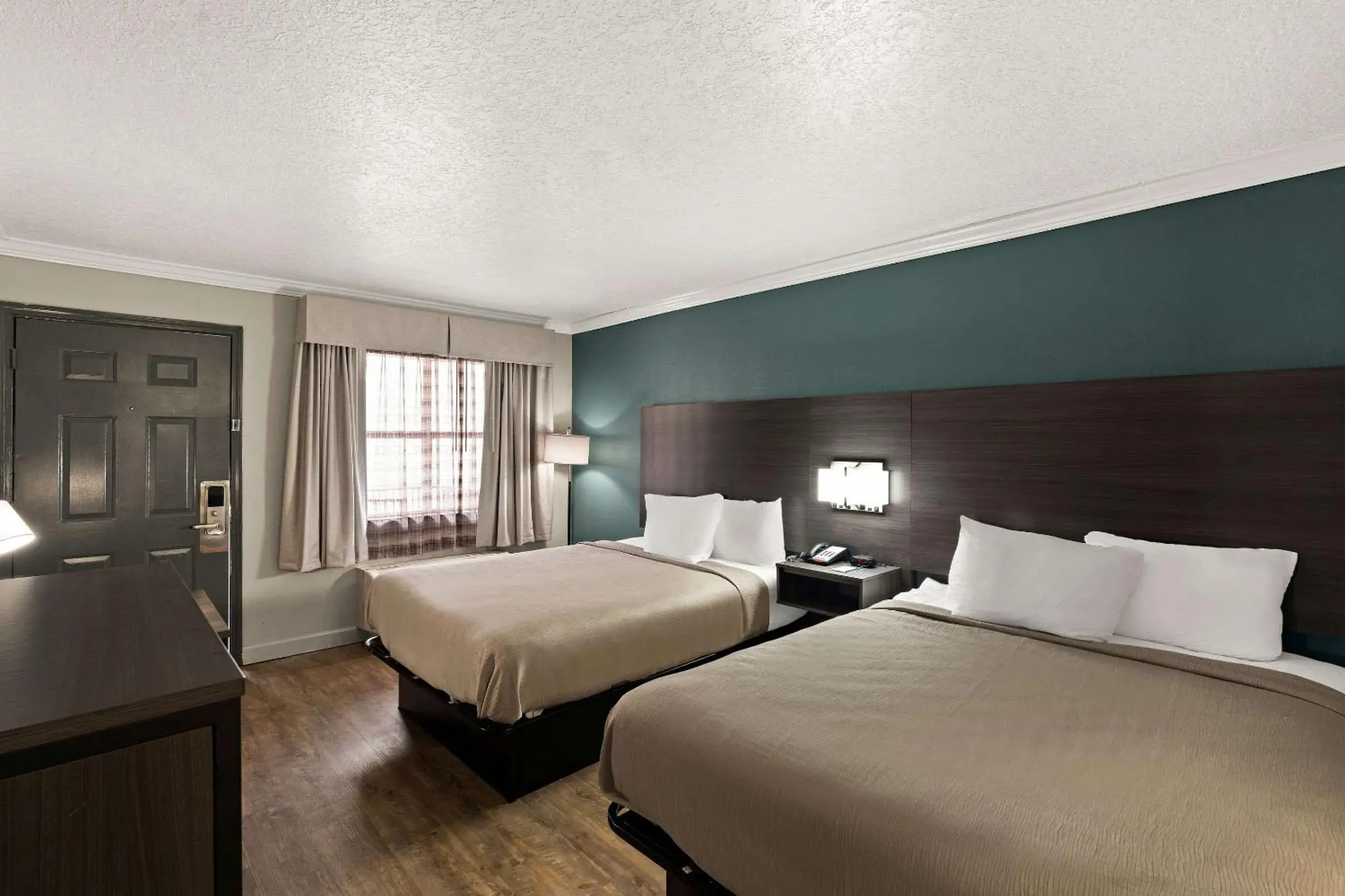 Bedroom, Bed in Travelodge by Wyndham Ocean Springs
