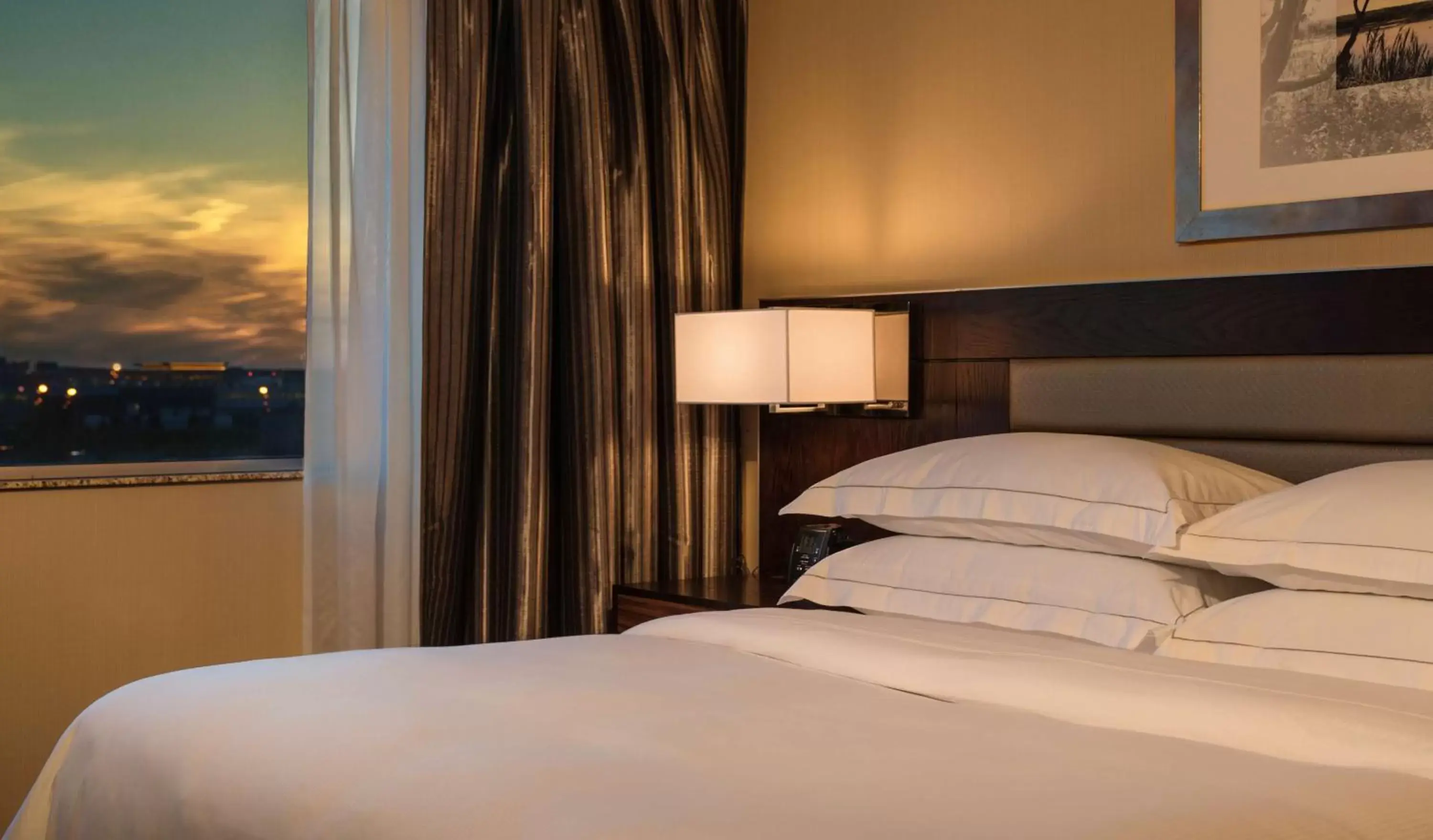Bed in Hilton Winnipeg Airport Suites