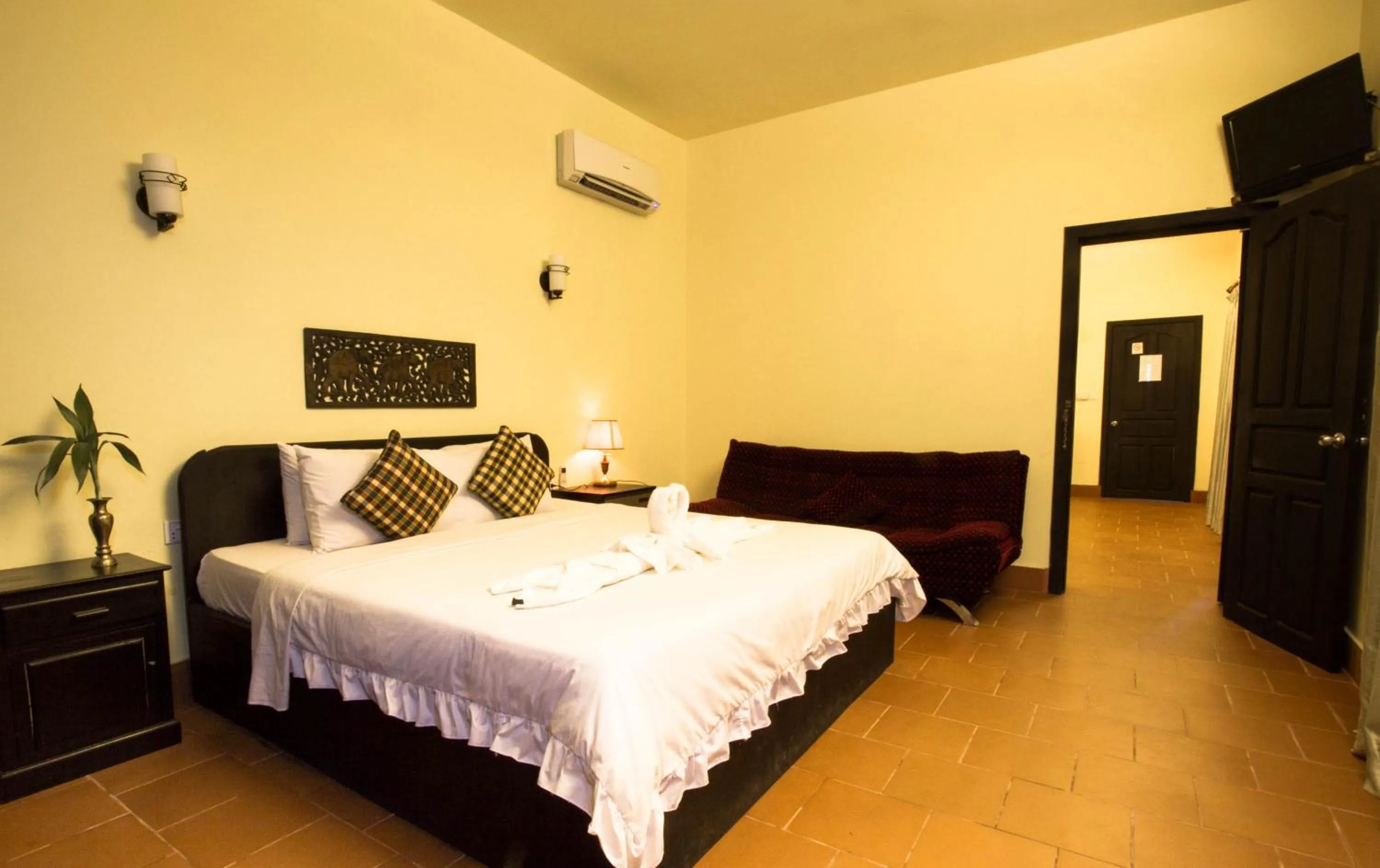 Photo of the whole room, Bed in Sonalong Boutique Village & Resort