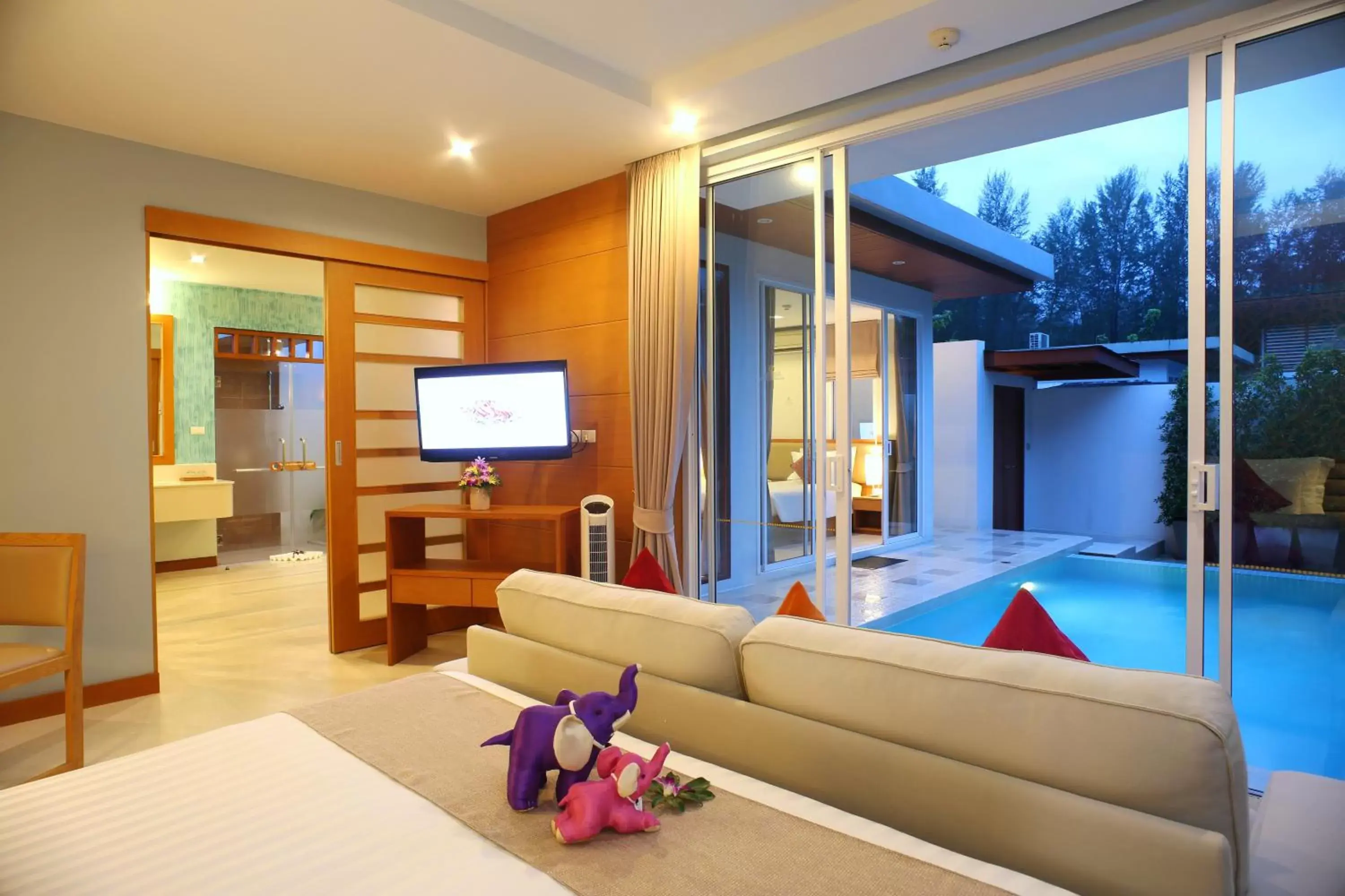 TV and multimedia, Bed in Apsara Beachfront Resort & Villa - SHA Extra Plus TV and multimedia, Bed in Apsara Beachfront Resort & Villa - SHA Extra Plus