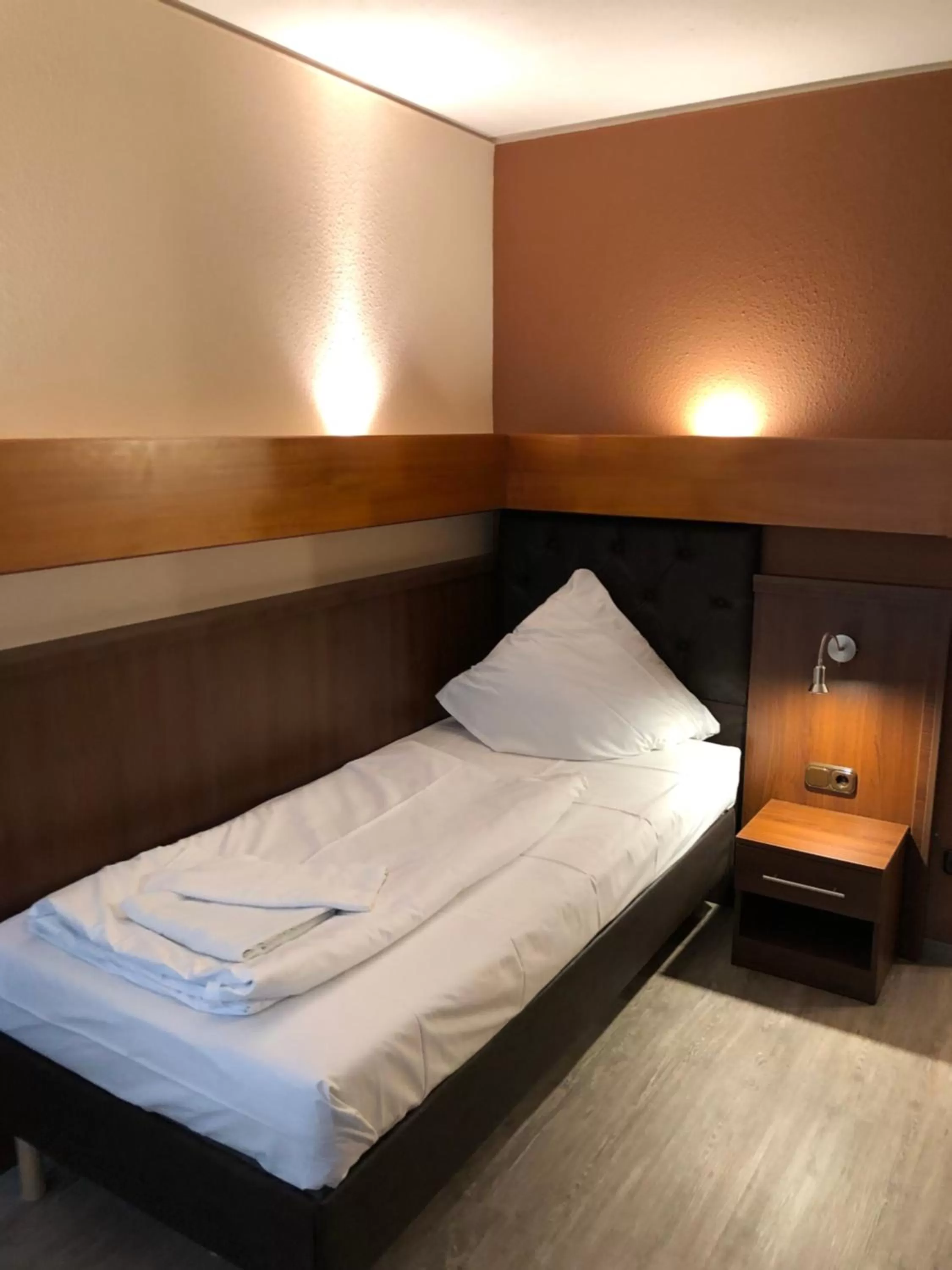 Bed in Hotel Poseidon