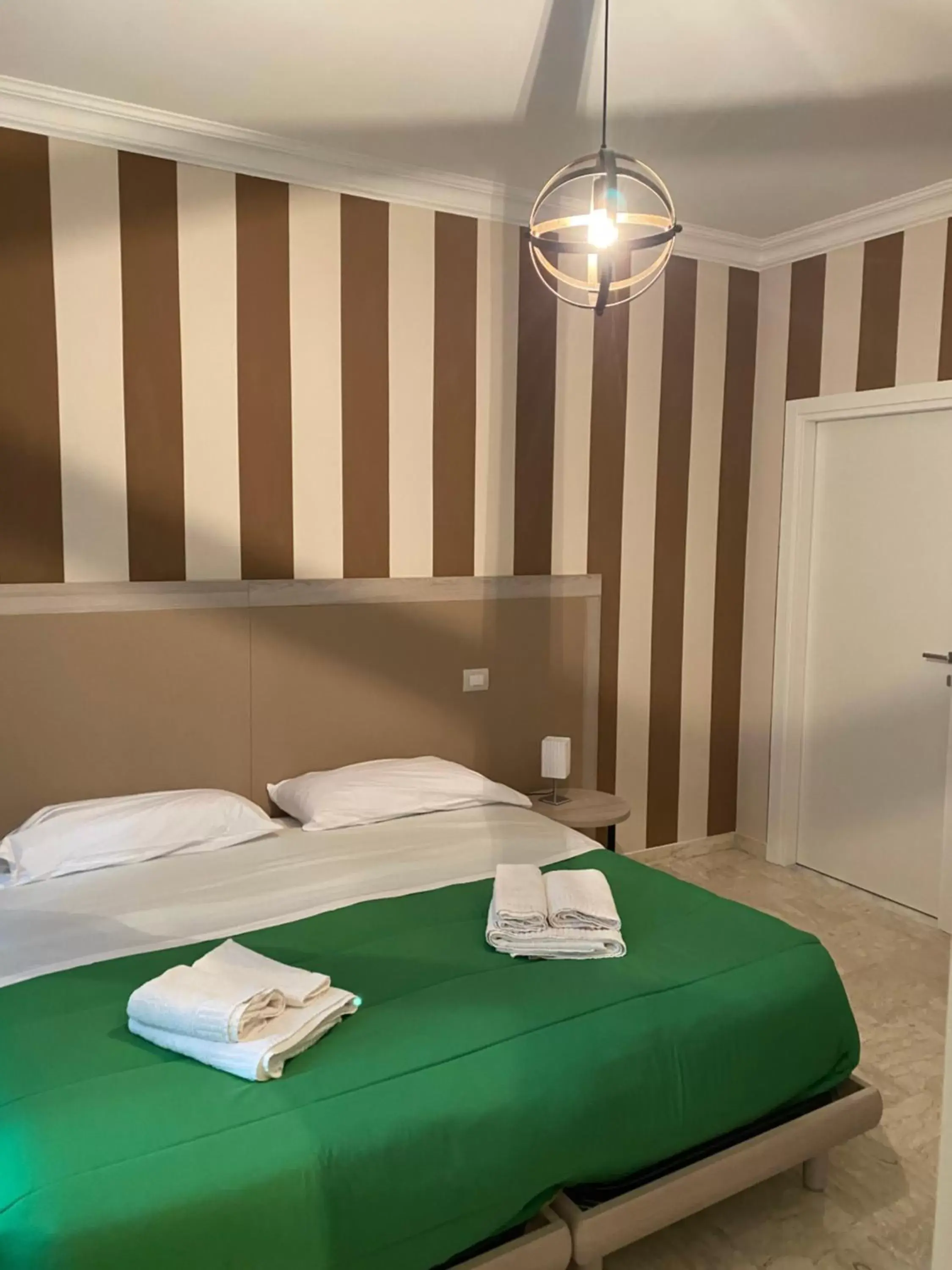 Photo of the whole room, Bed in Suite in Città residence