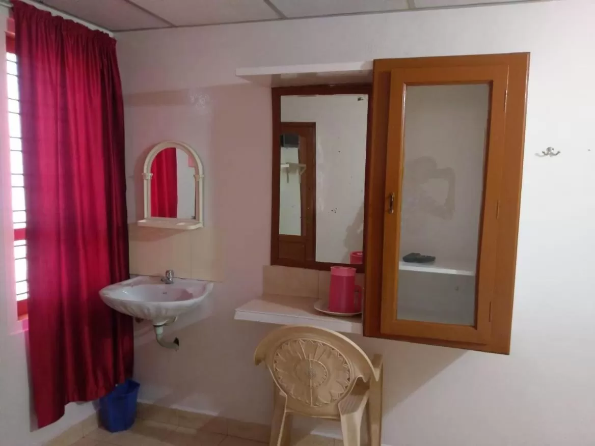 Bathroom in Anandan Tourist Home