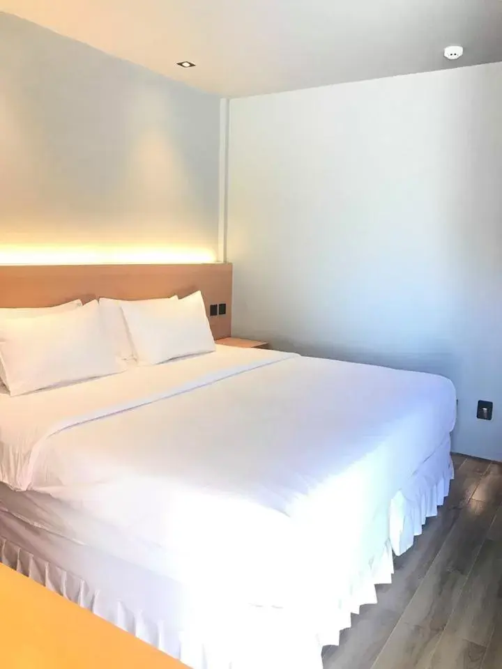 Bed in Mayfair Resort