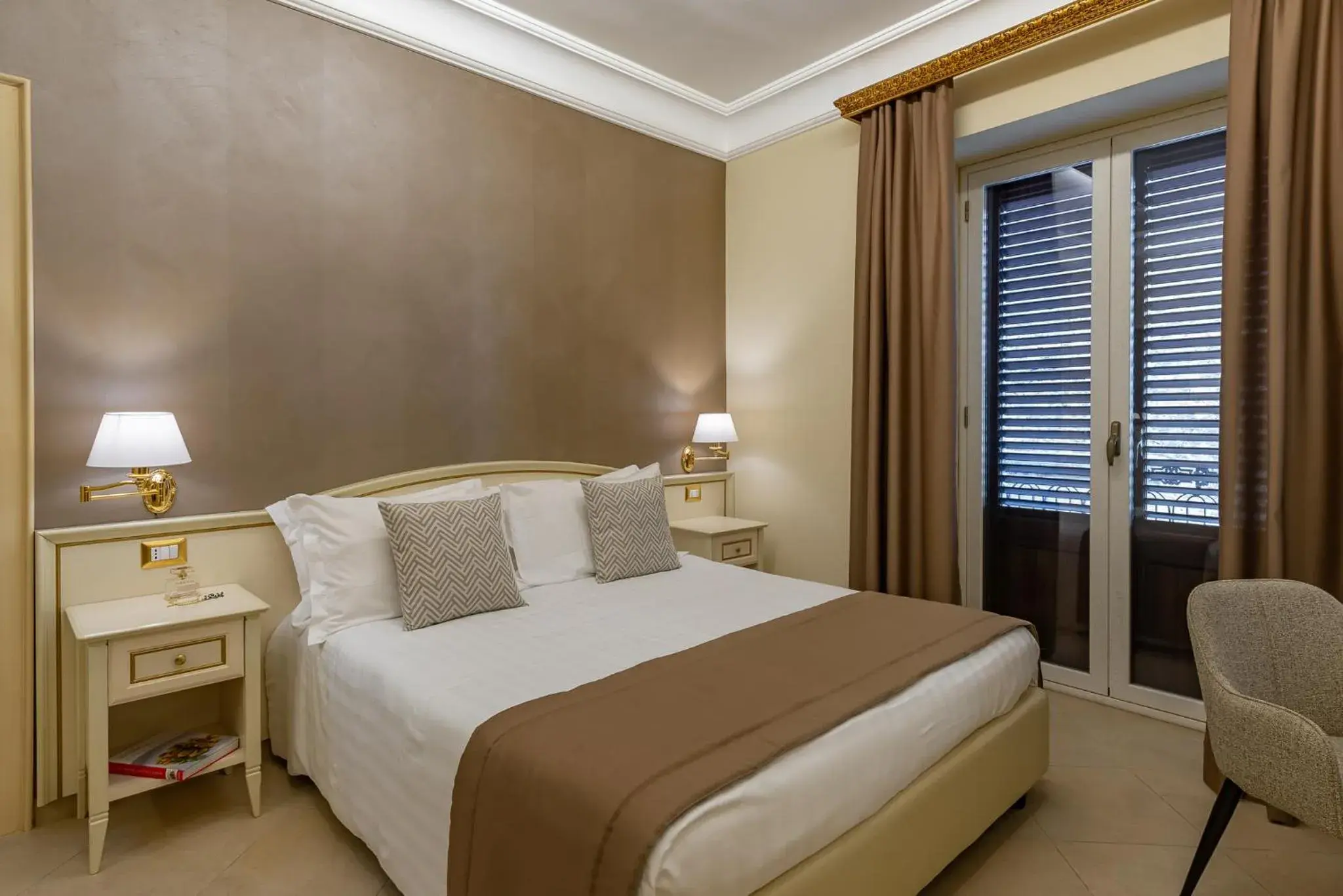 Bed in Vittorio Emanuele Boutique Hotel