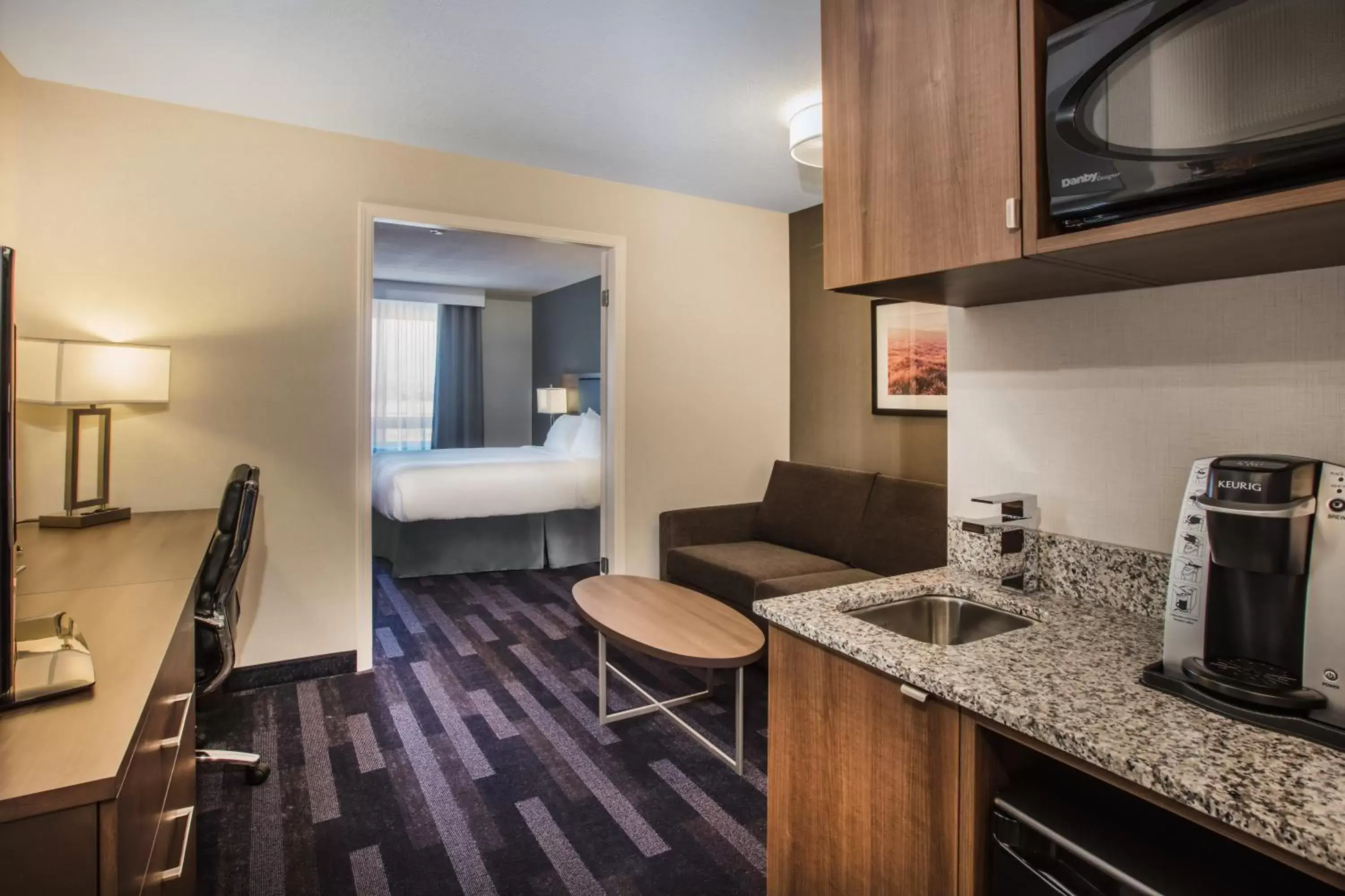 Coffee/tea facilities, Kitchen/Kitchenette in Holiday Inn & Suites Grande Prairie, an IHG Hotel