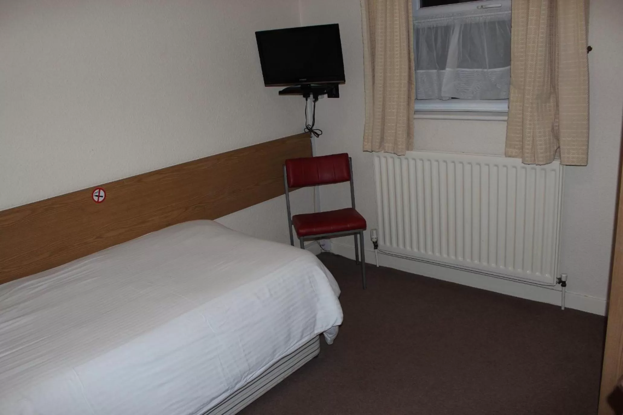 Bed in The Premier Lodge