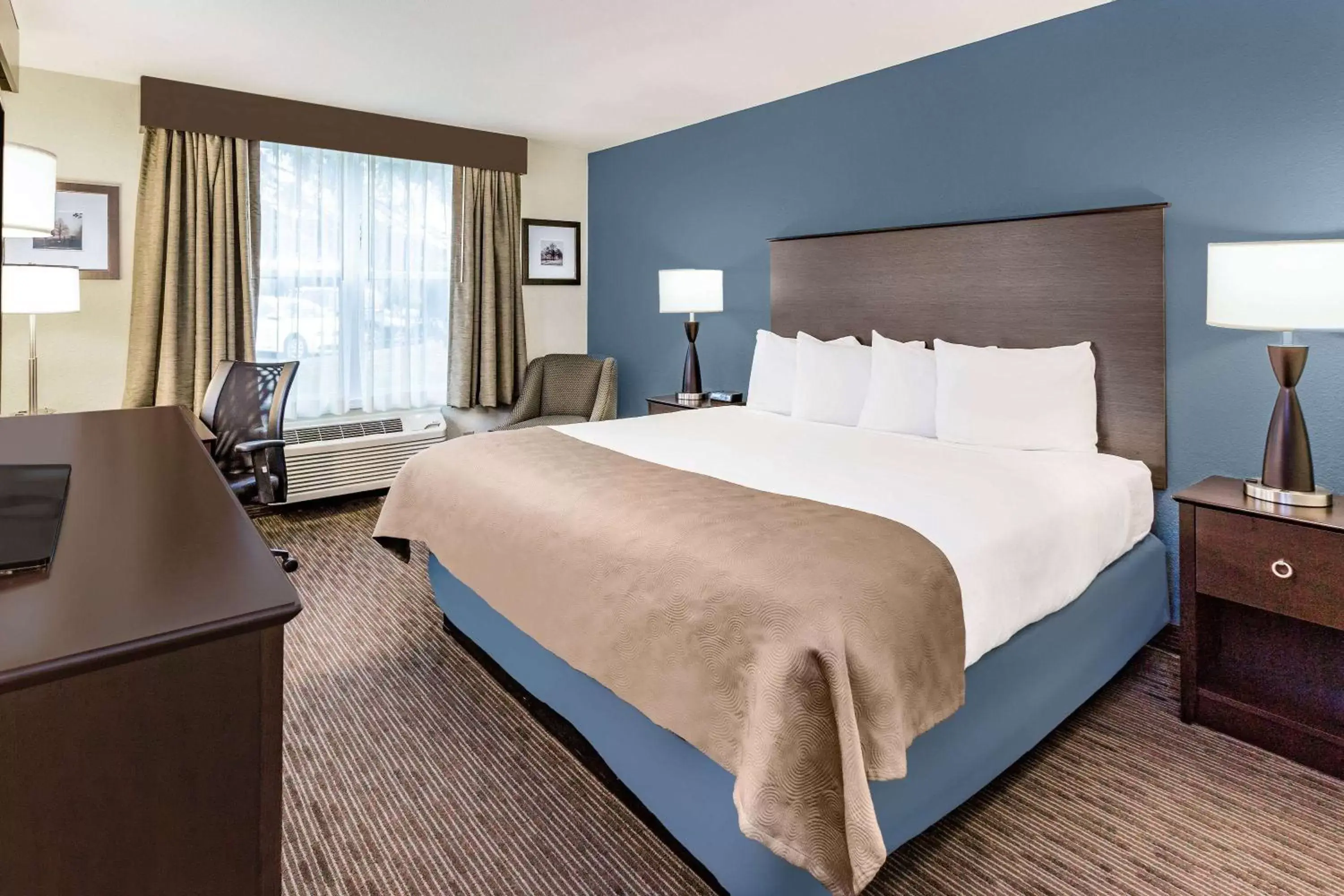 Photo of the whole room, Bed in AmericInn by Wyndham Burnsville