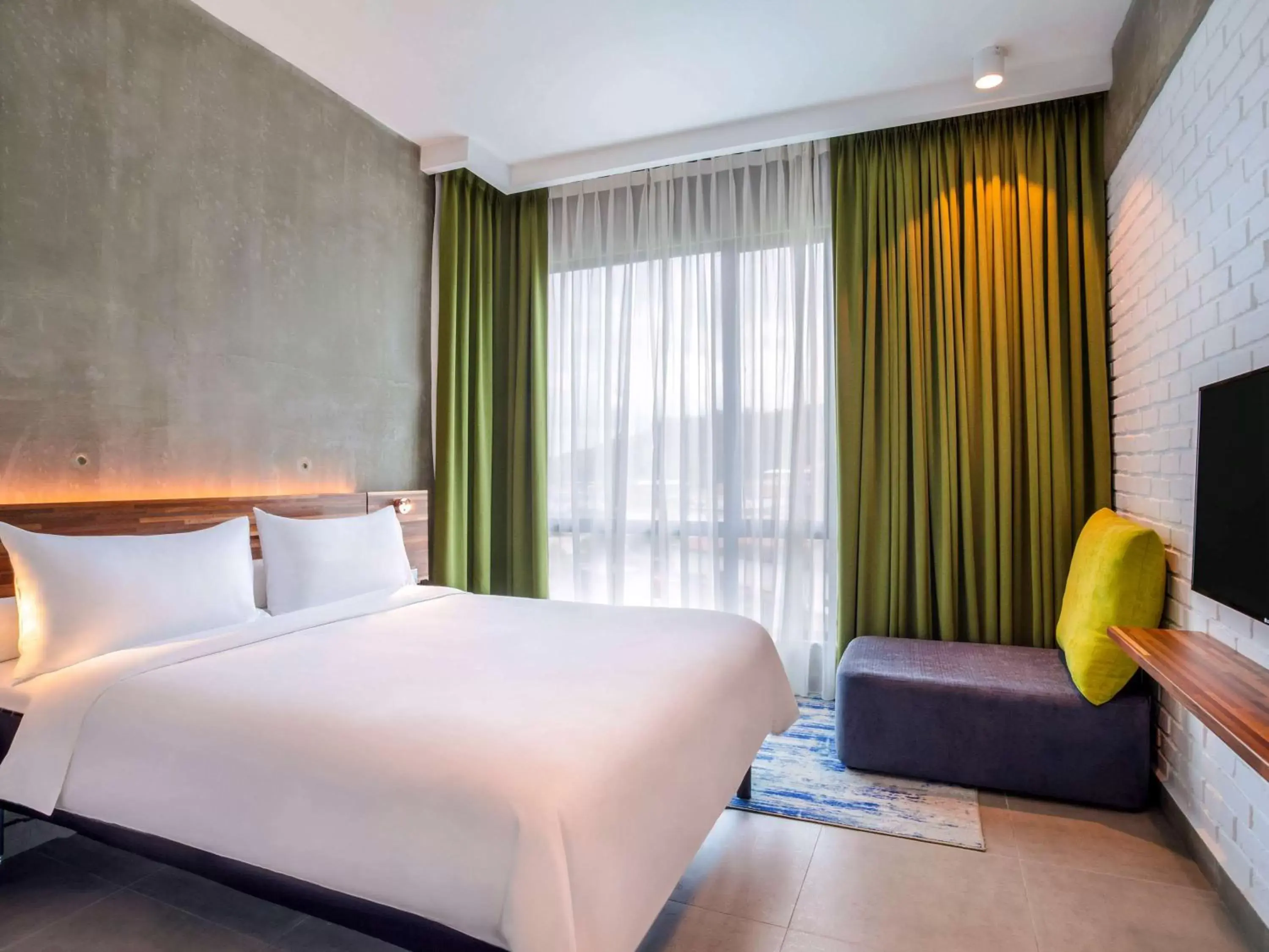 Photo of the whole room, Bed in ibis Styles Kota Kinabalu Inanam