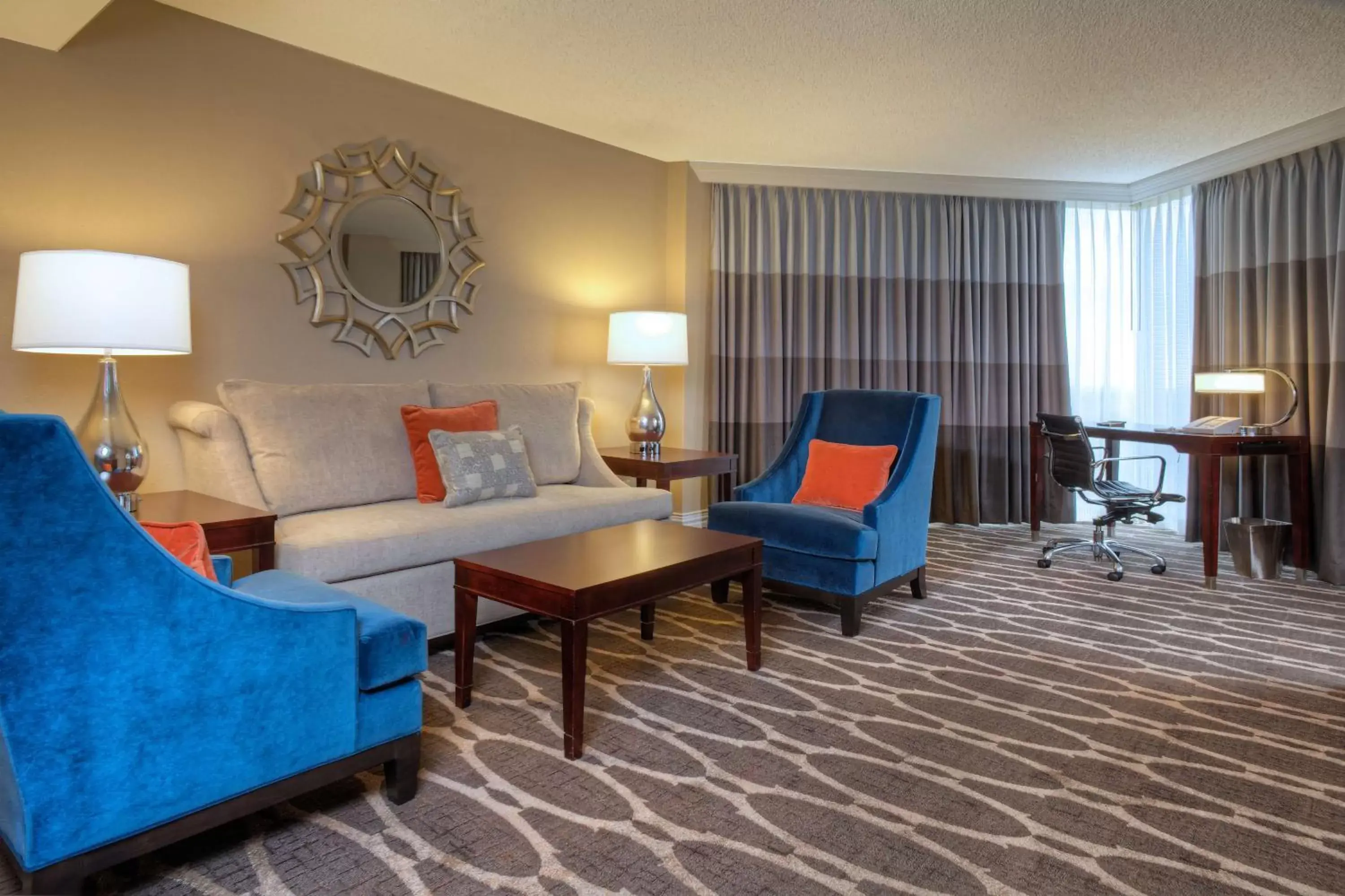 Living room, Seating Area in Hilton Houston Westchase