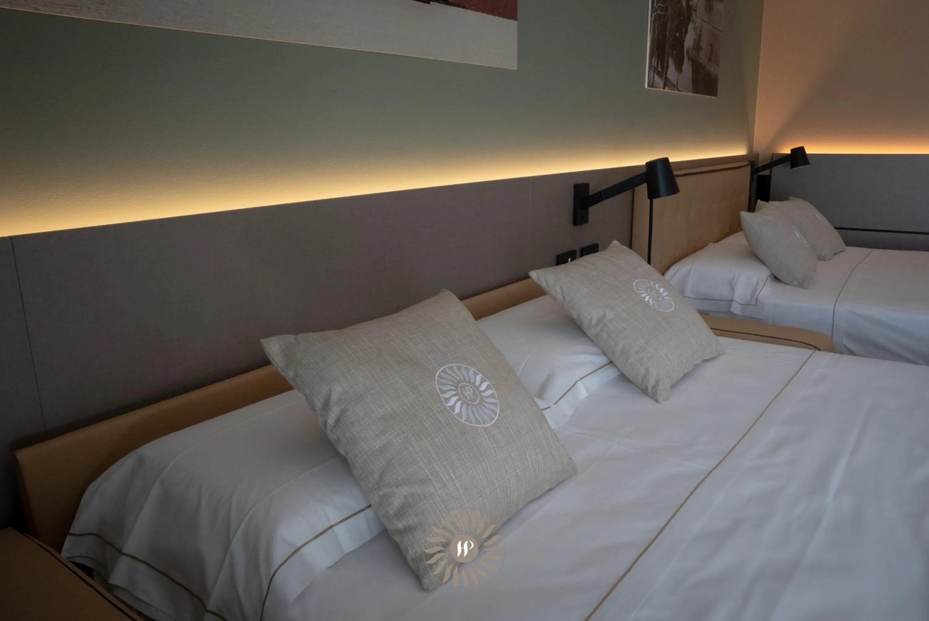 Bed in Hotel Puccini