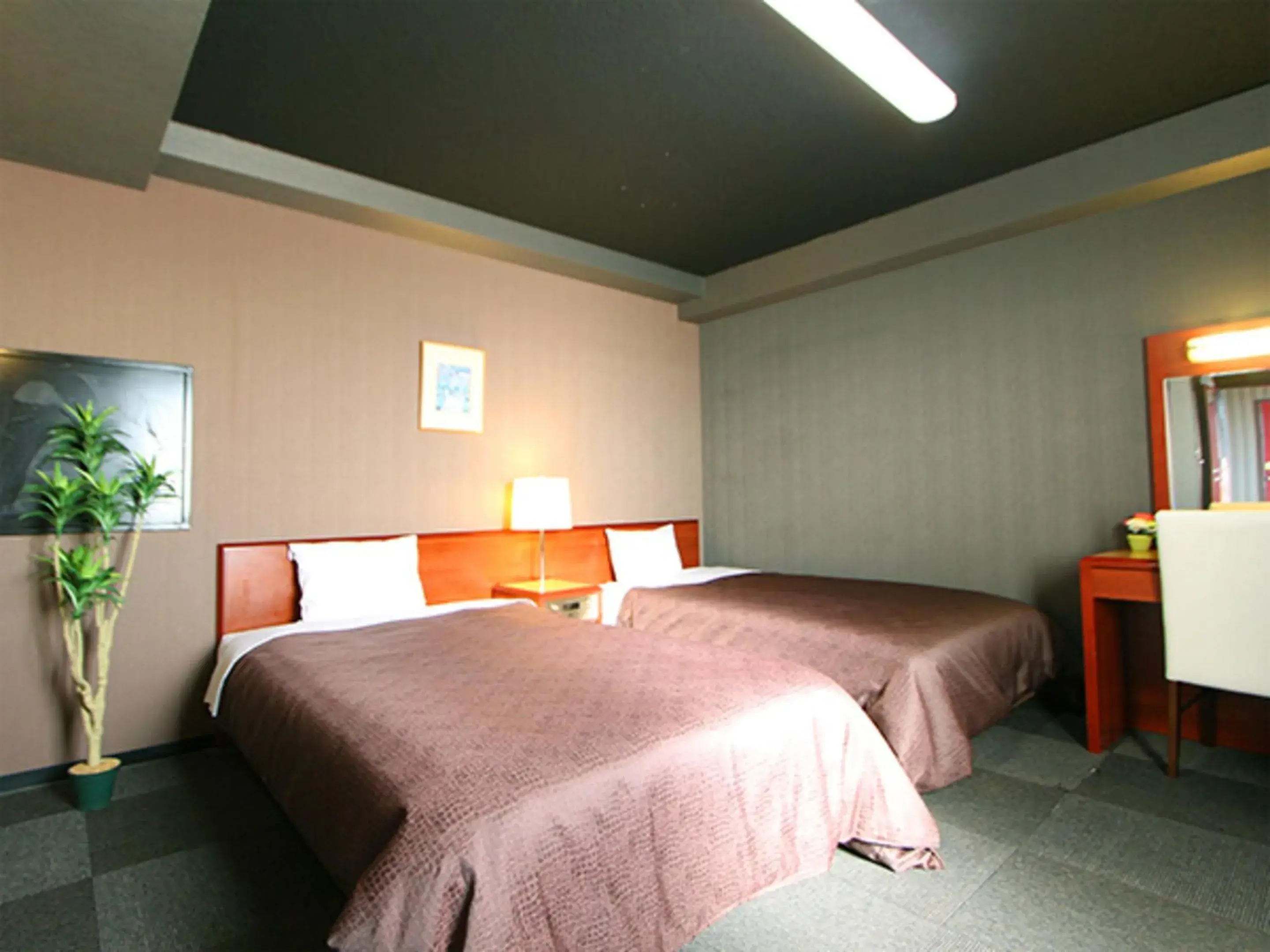 Bed in HOTEL LiVEMAX BUDGET Yokohama Tsurumi