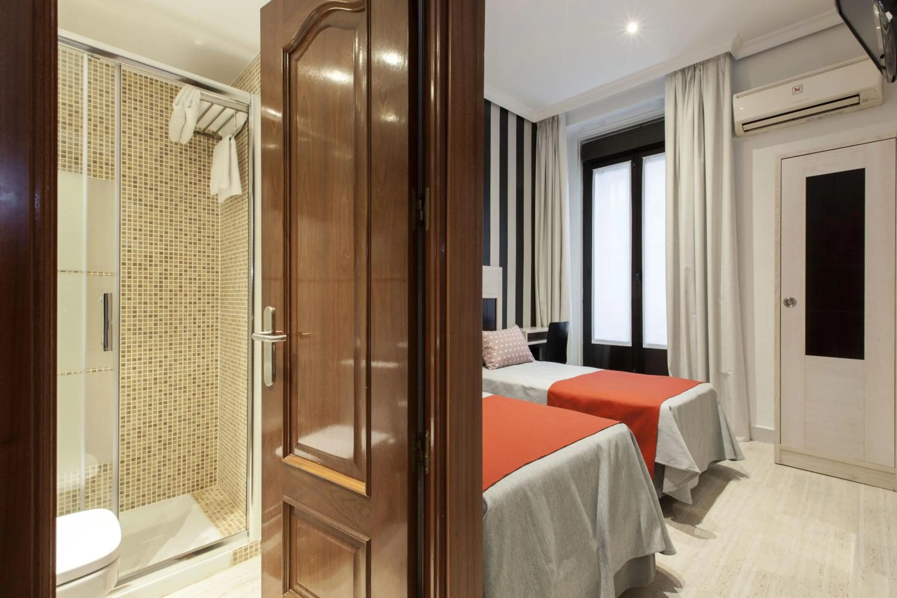 Photo of the whole room, Bed in Hostal Castilla I Atocha