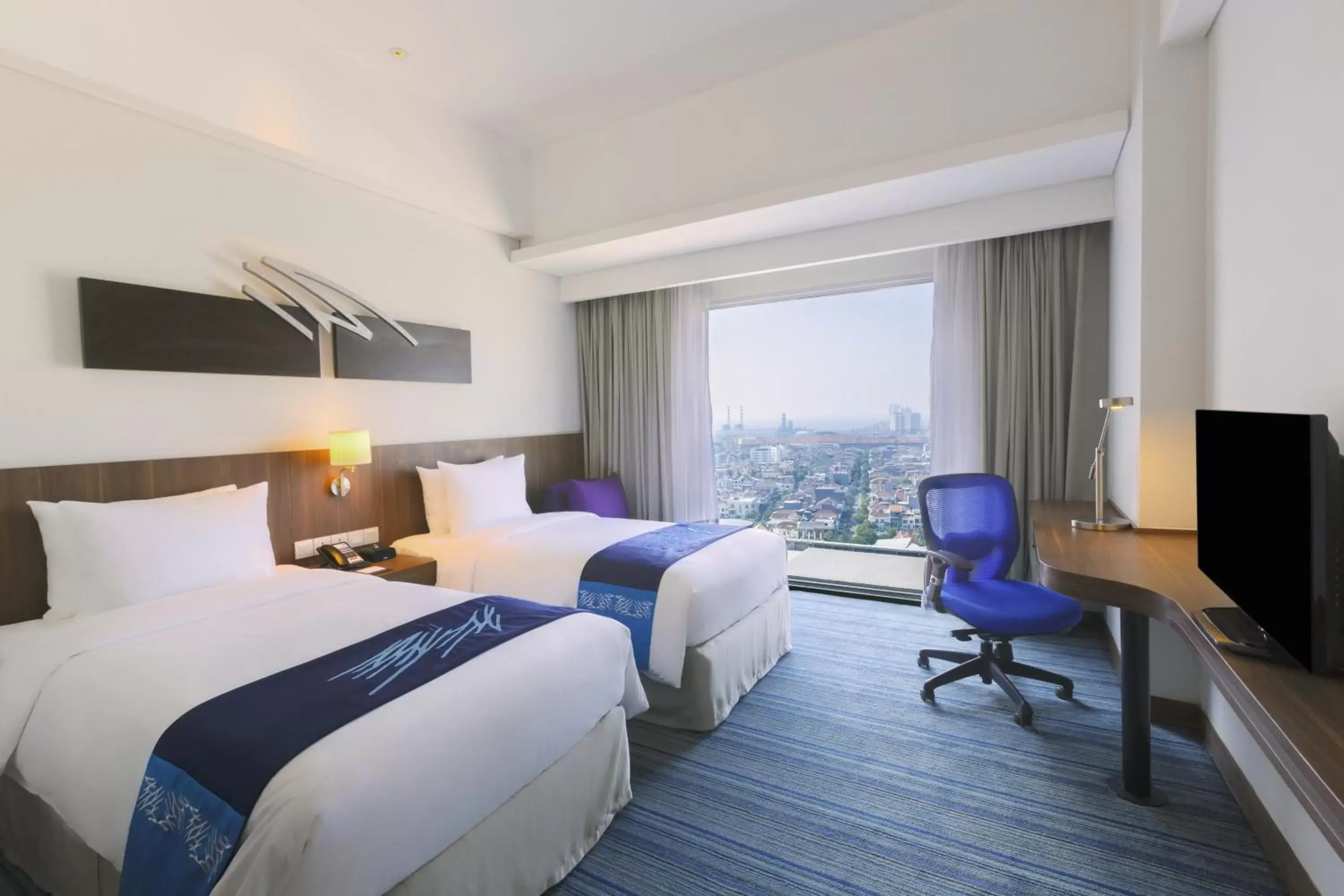 Bed in Holiday Inn Express Jakarta Pluit Citygate, an IHG Hotel