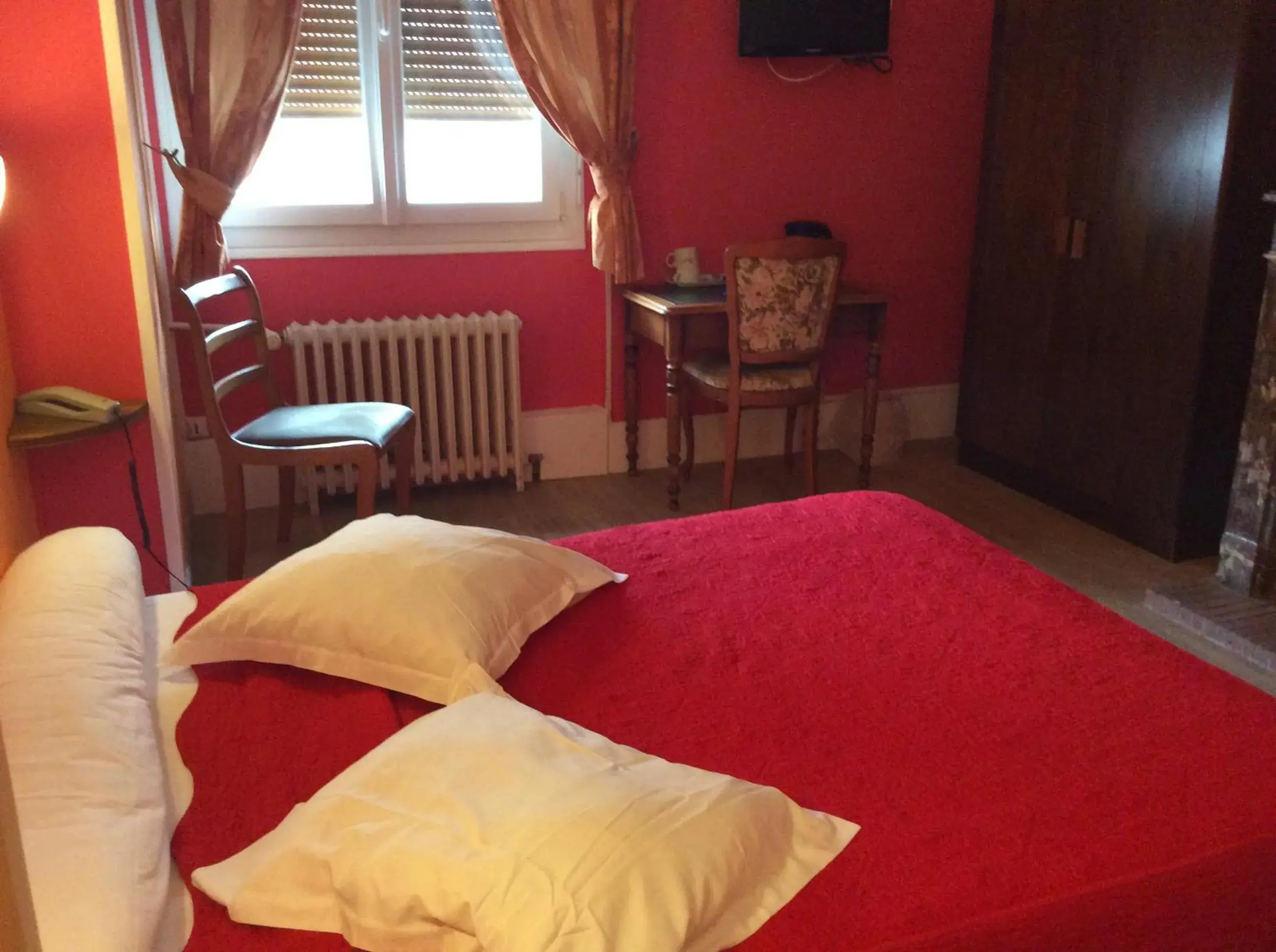 Bed in Hotel du Cygne