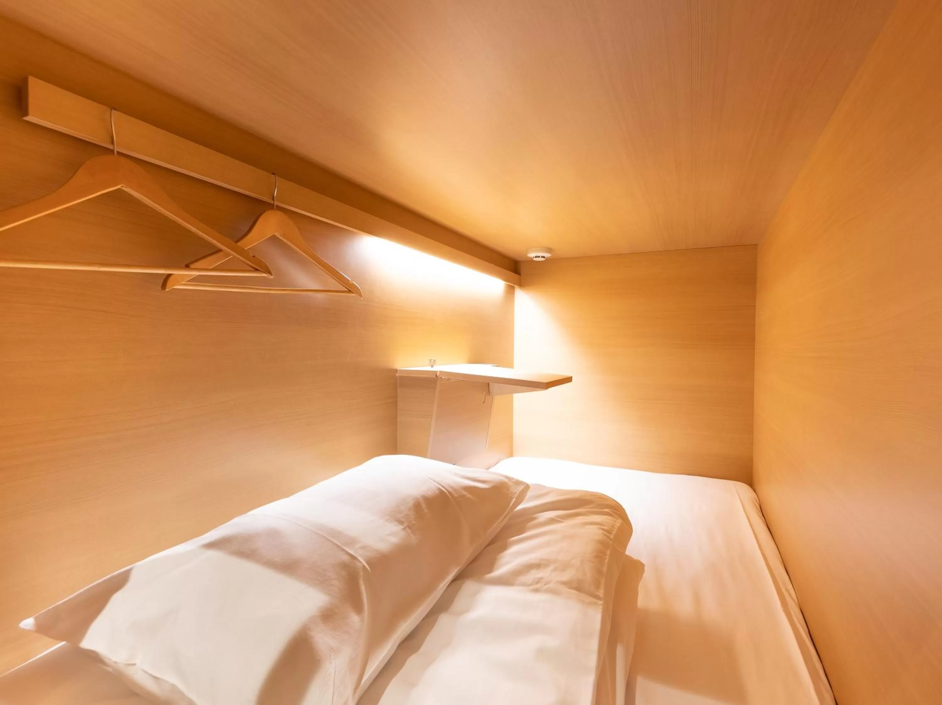 Bed in Hiromas Hotel Kura