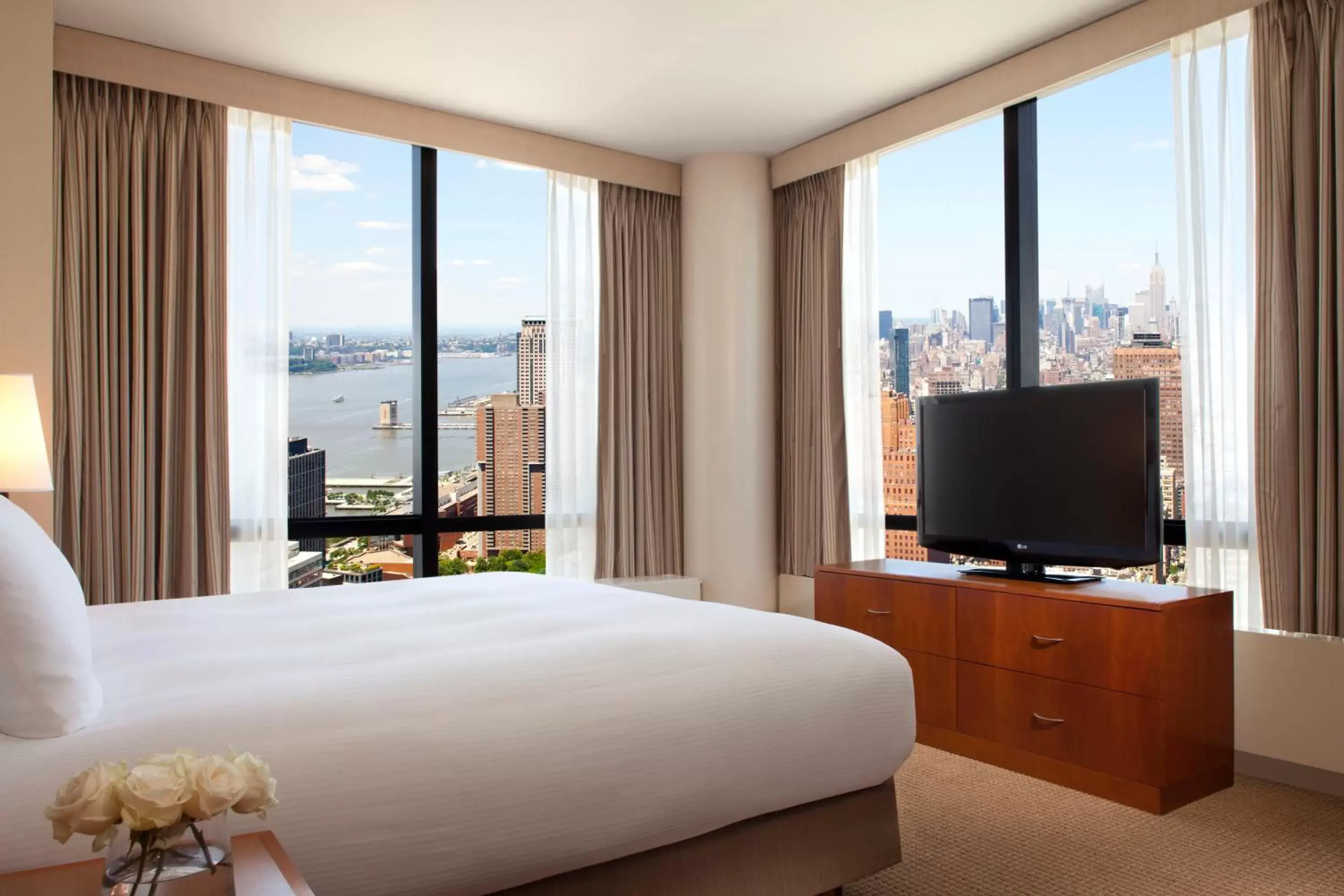 Bed, TV/Entertainment Center in Millennium Downtown New York
