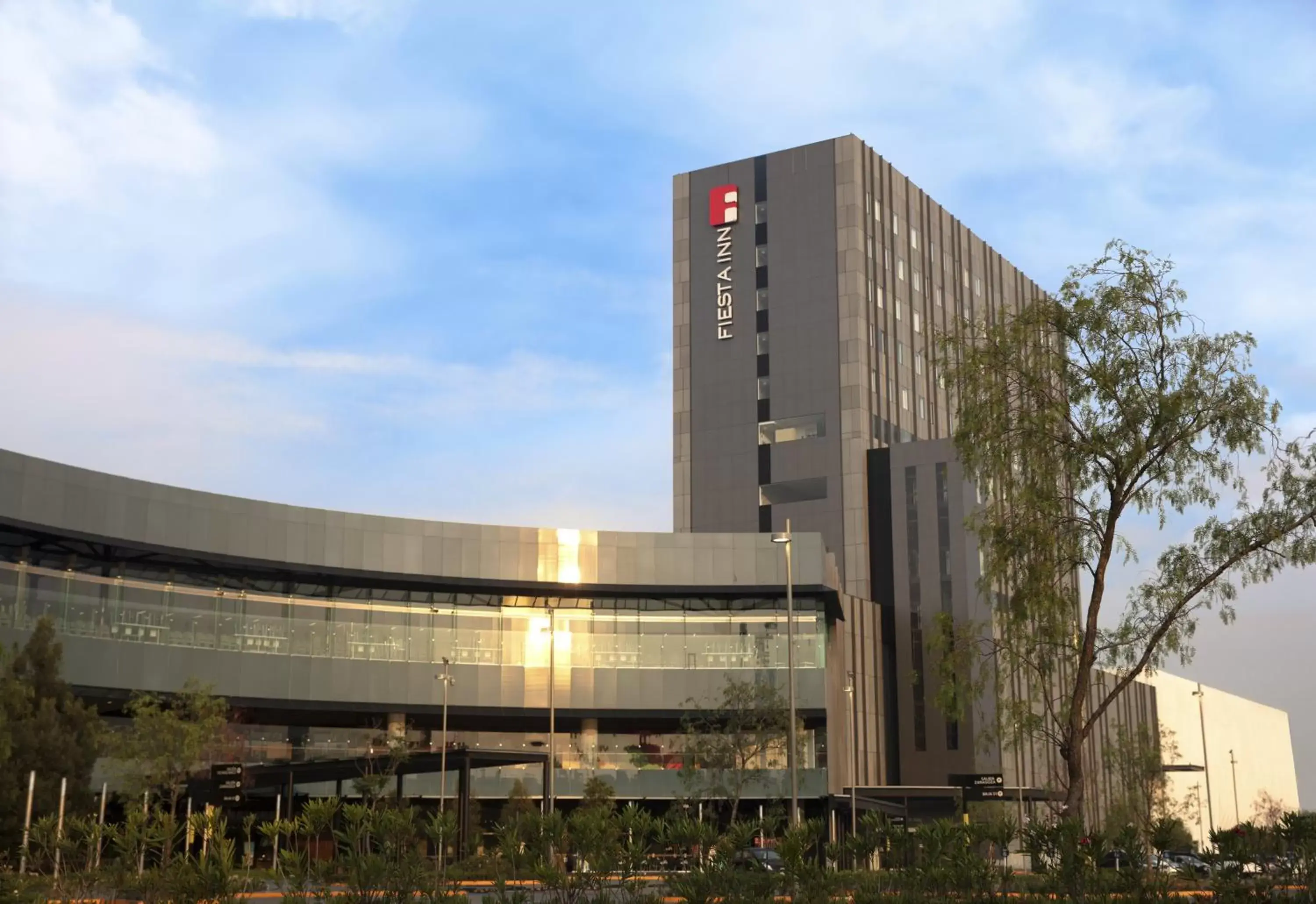Property building in Fiesta Inn Parque Puebla Property building in Fiesta Inn Parque Puebla