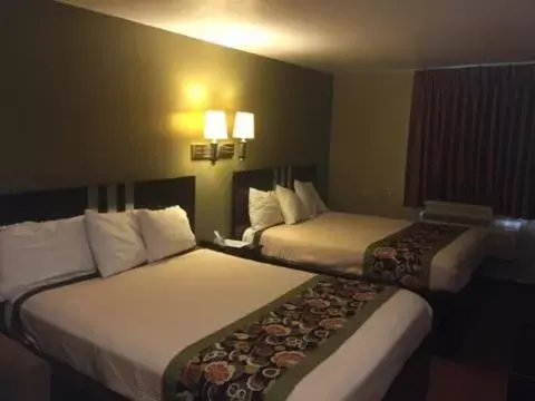 Bed in Americas Best Value Inn Caldwell