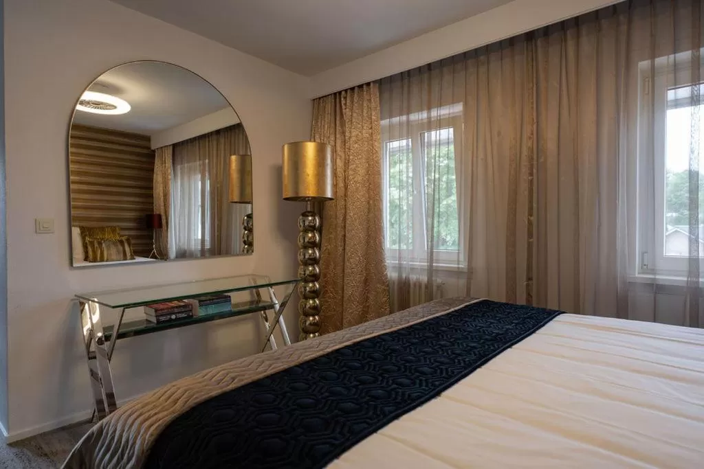 Bed in Boutique Hotel Slenaker Vallei - Buitengewoongenieten