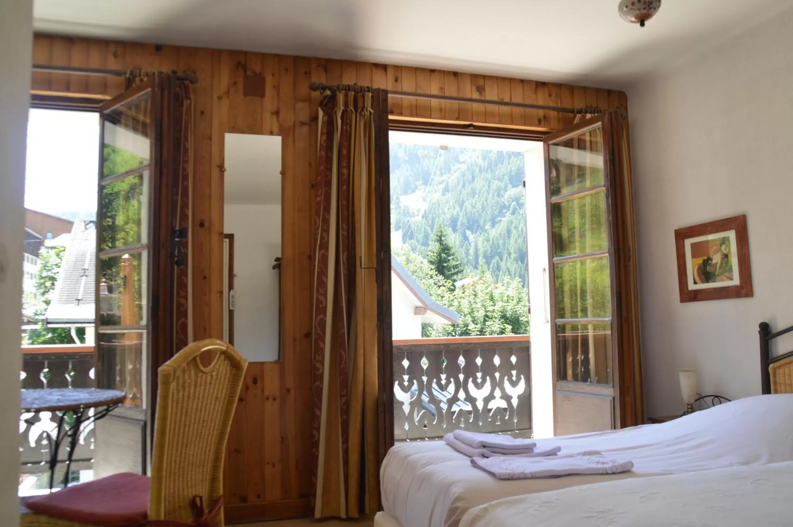 Bed, View in Hotel Le Genepy