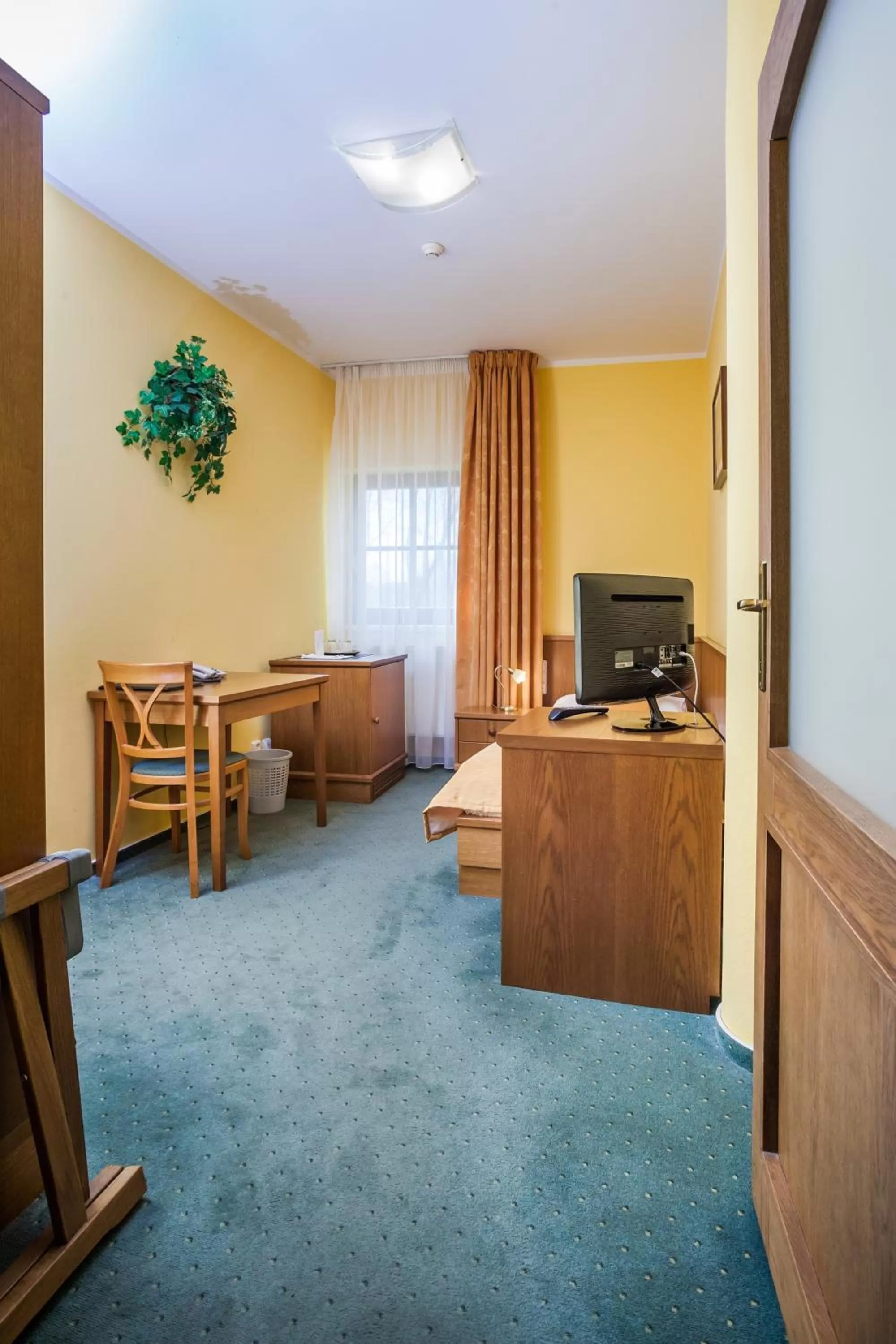 Bedroom in Hotel Jelínkova vila