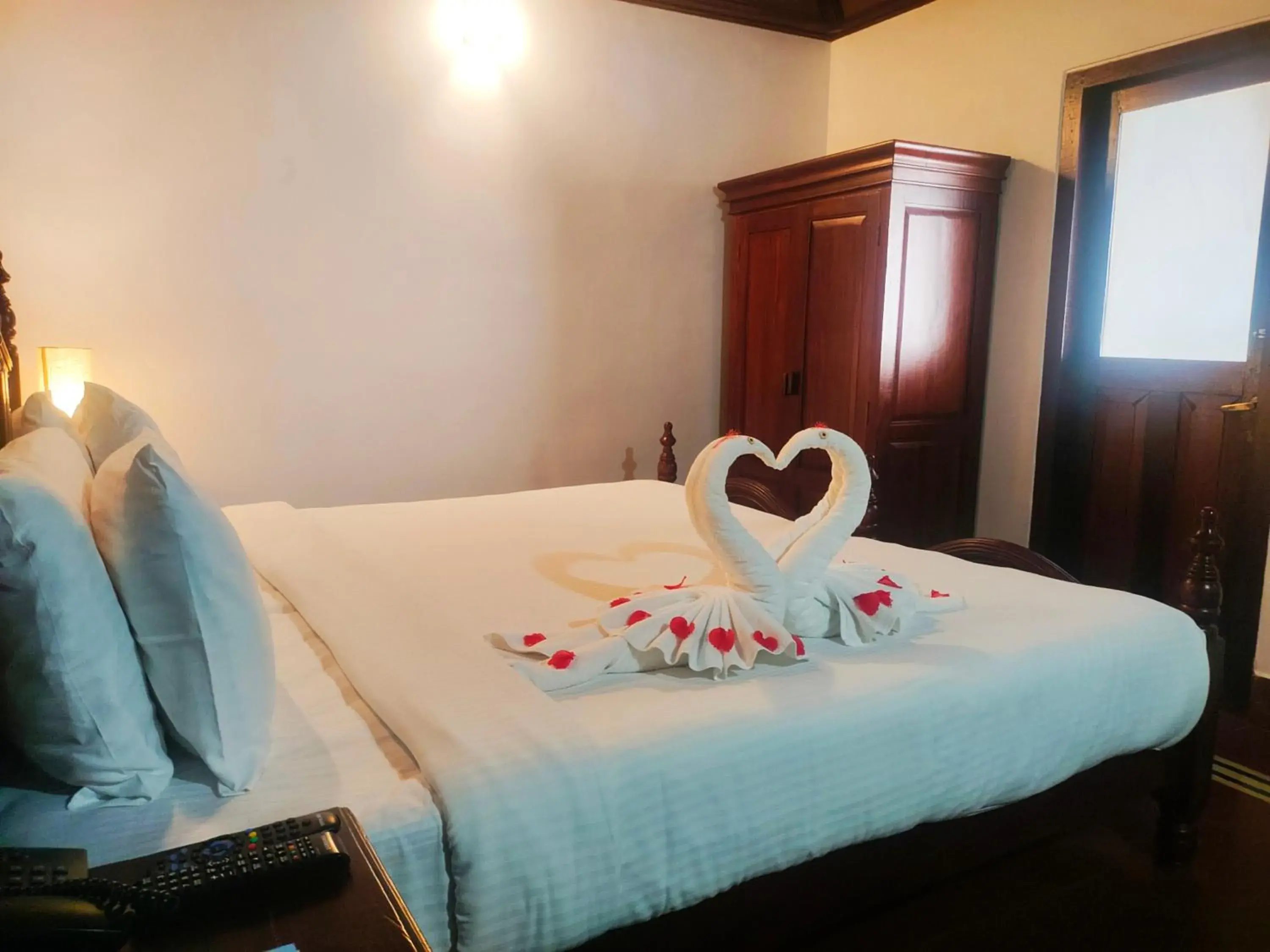 Bed in The Travancore Heritage Beach Resort