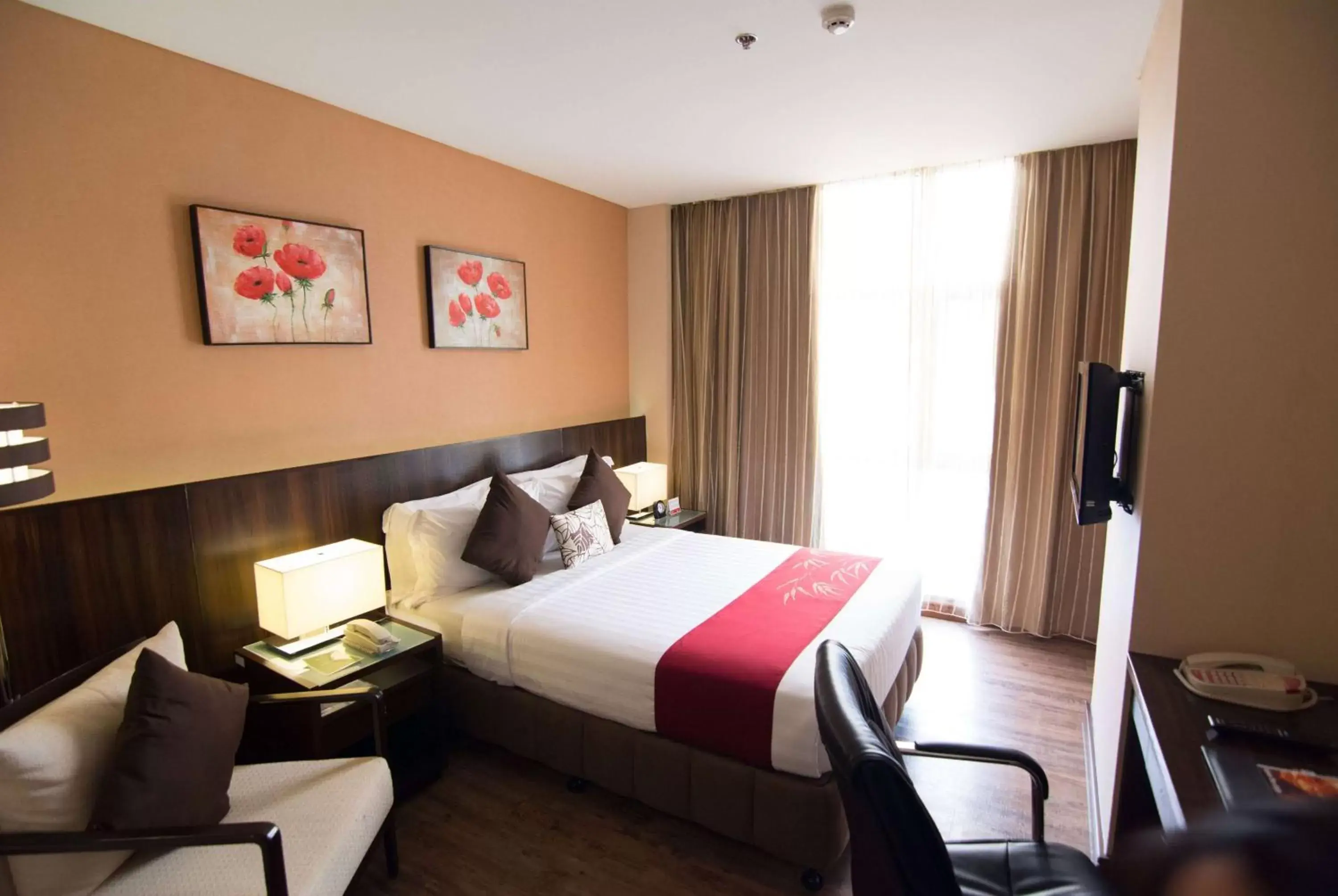 Photo of the whole room, Bed in Ramada by Wyndham Manila Central
