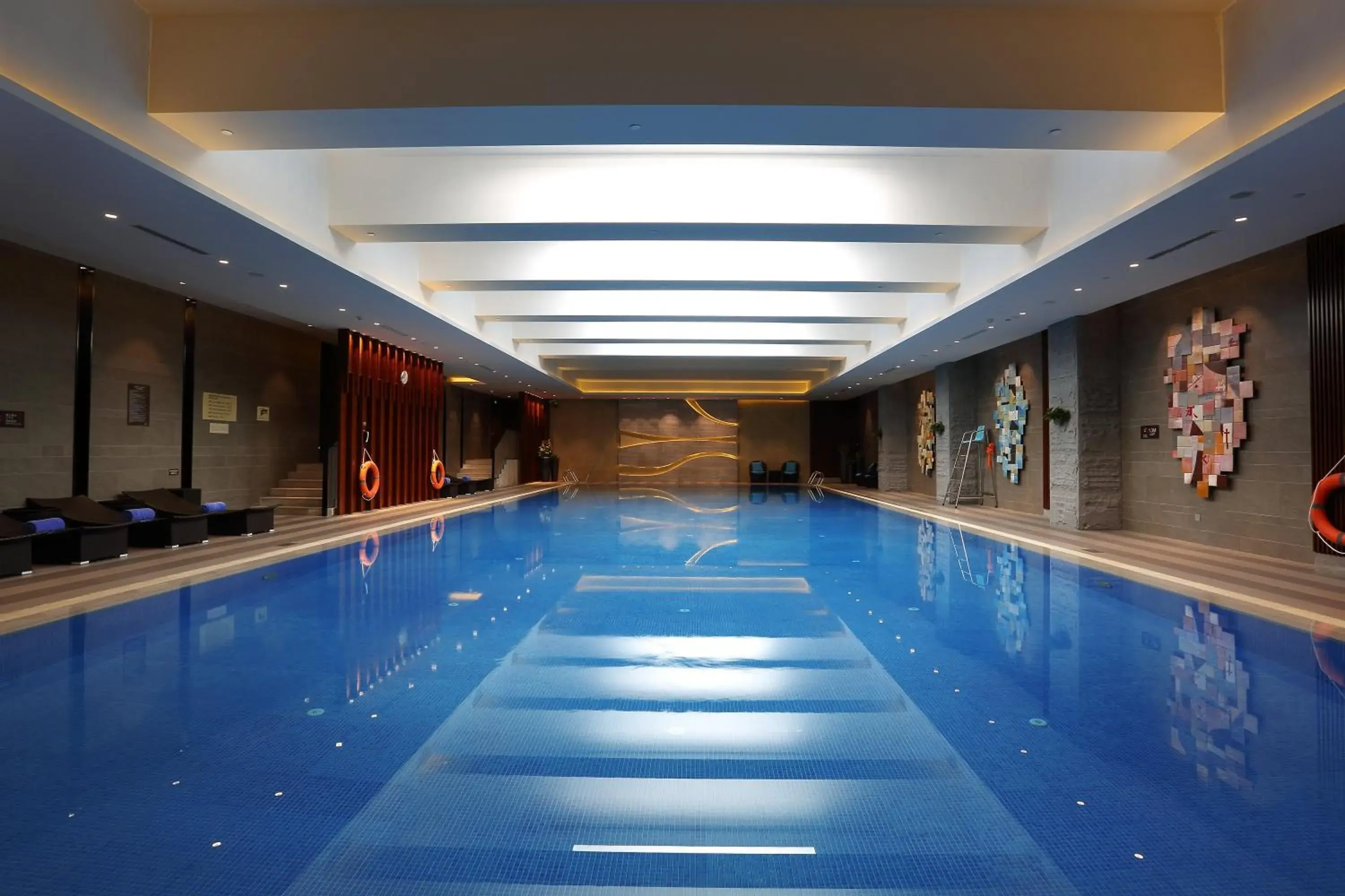Swimming Pool in HUALUXE Yangjiang City Center, an IHG Hotel